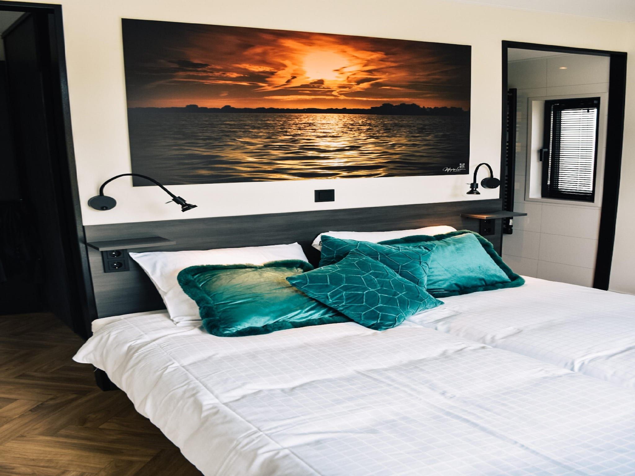 Een slaapkamer van MarinaPark Nieuw Loosdrecht 2 in Nieuw-Loosdrecht