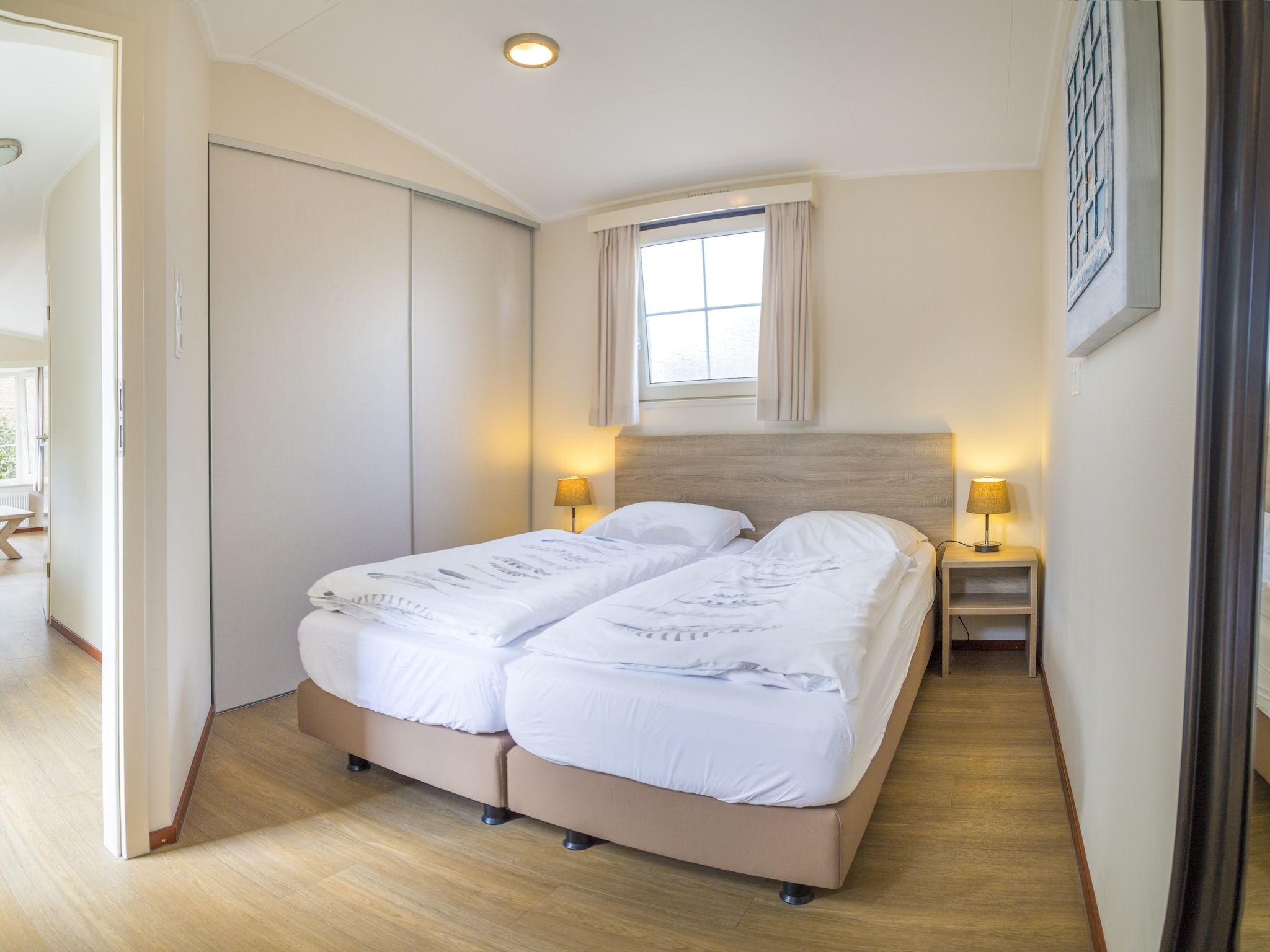 Een slaapkamer van Vakantiepark Duinrust 3 in Noordwijk aan zee