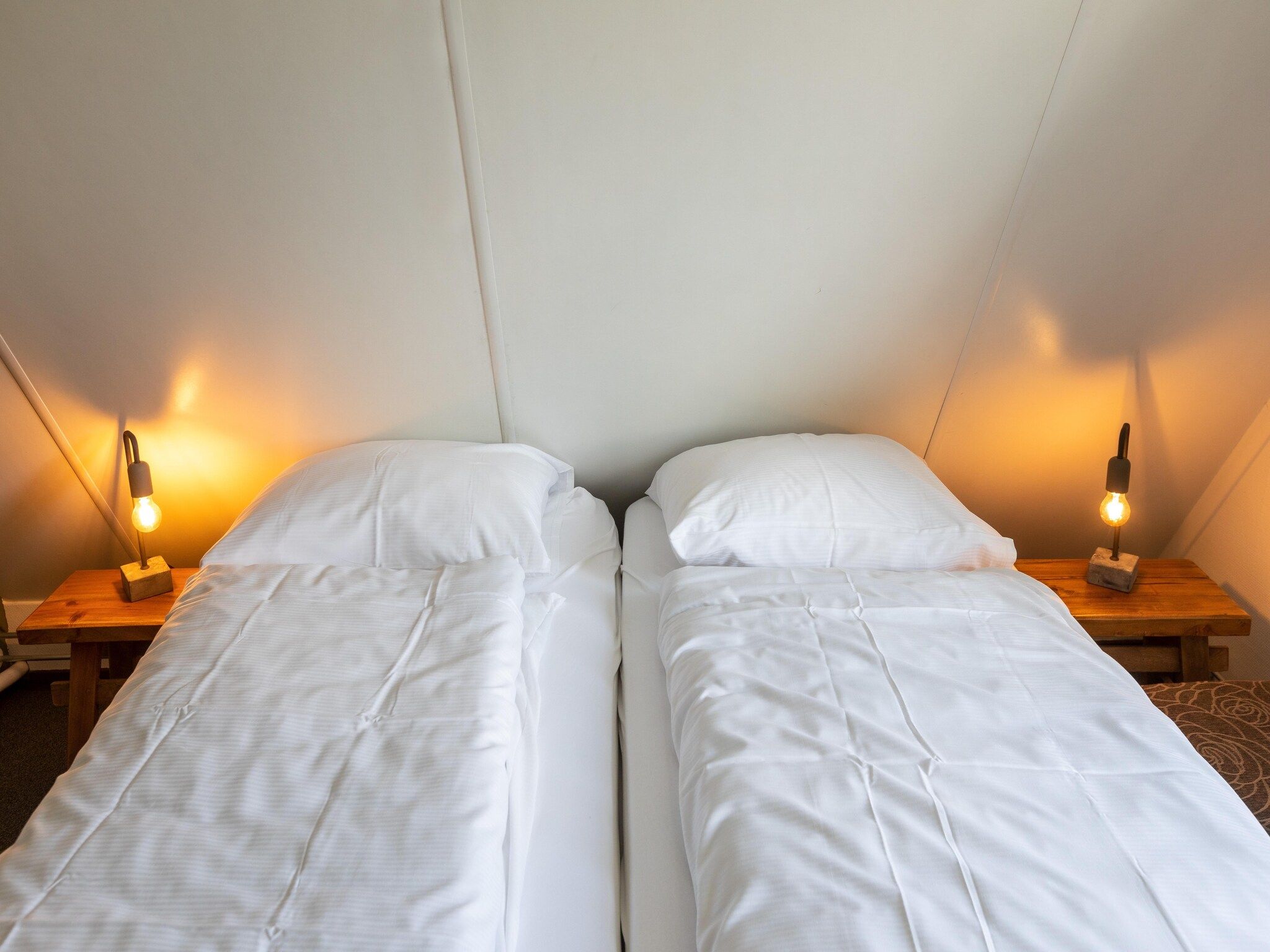 Een slaapkamer van Vakantie bij Meeussen - Molendal 4 in Plasmolen