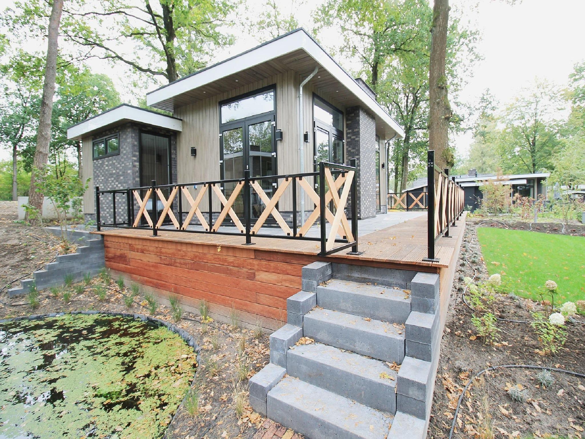 De buitenkant van Vakantiepark De Rimboe & De Woeste Hoogte 42 in Hoenderloo