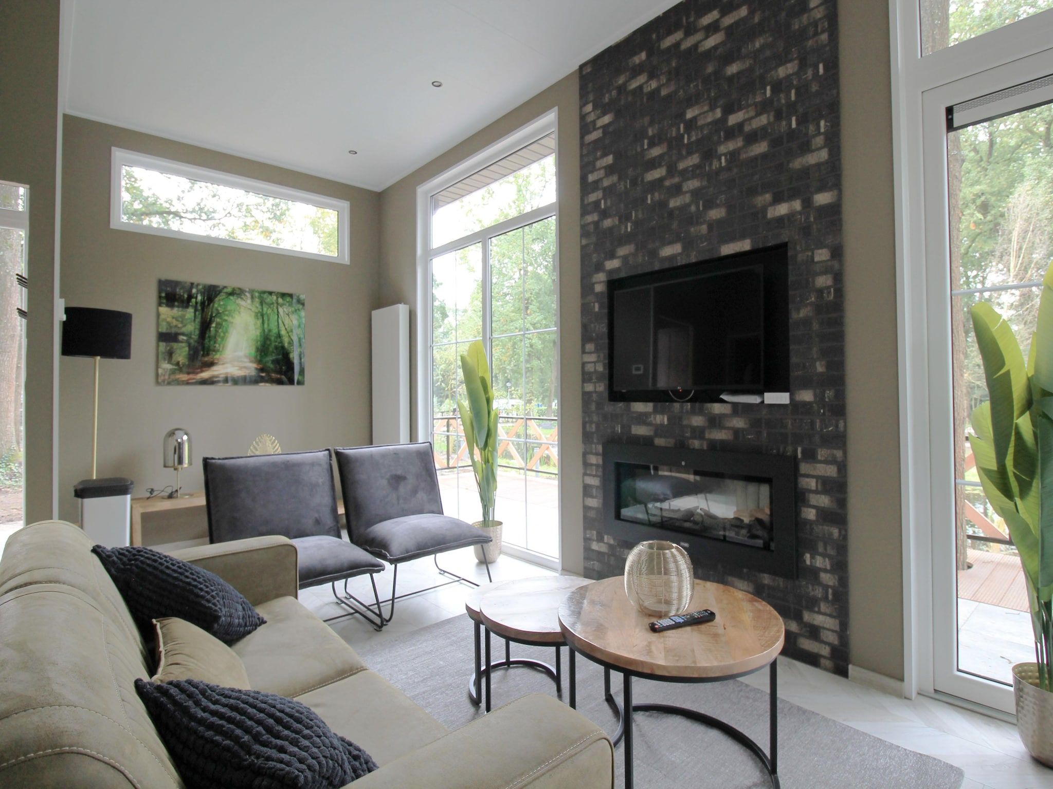 De woonkamer van Vakantiepark De Rimboe & De Woeste Hoogte 42 in Hoenderloo