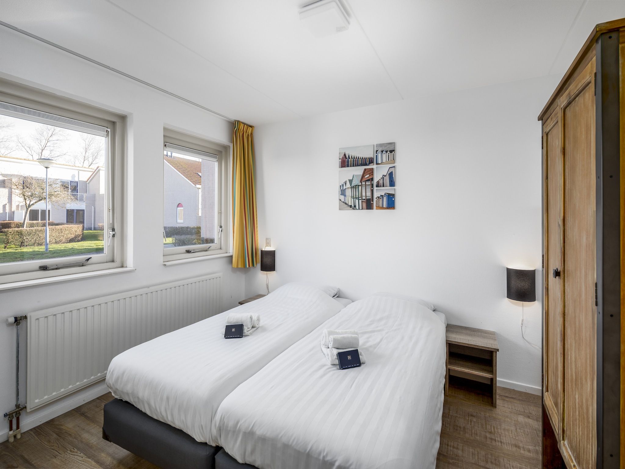 Een slaapkamer van Vakantiepark de Soeten Haert 20 in Renesse