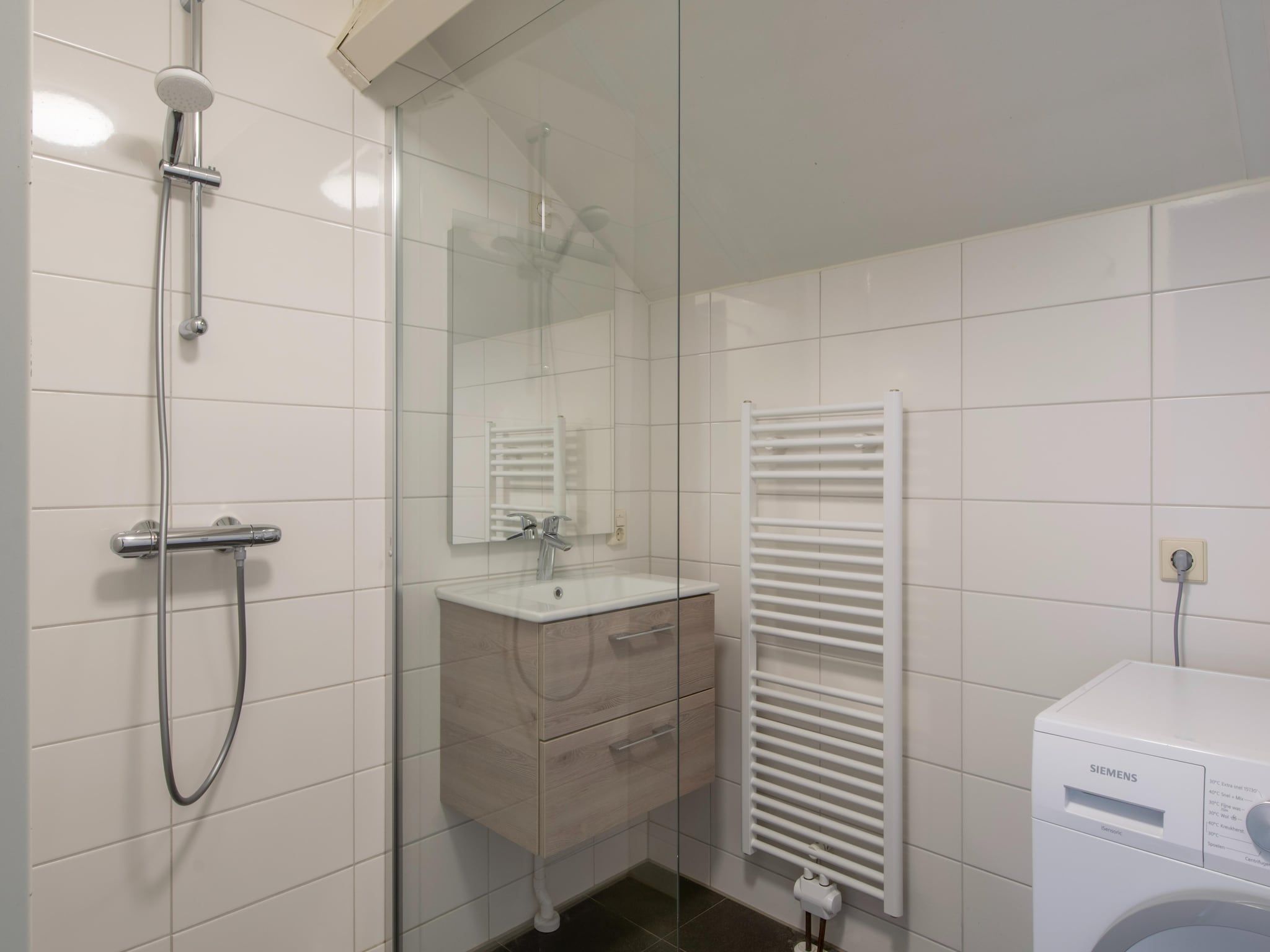 De badkamer van Vakantiepark de Soeten Haert 20 in Renesse