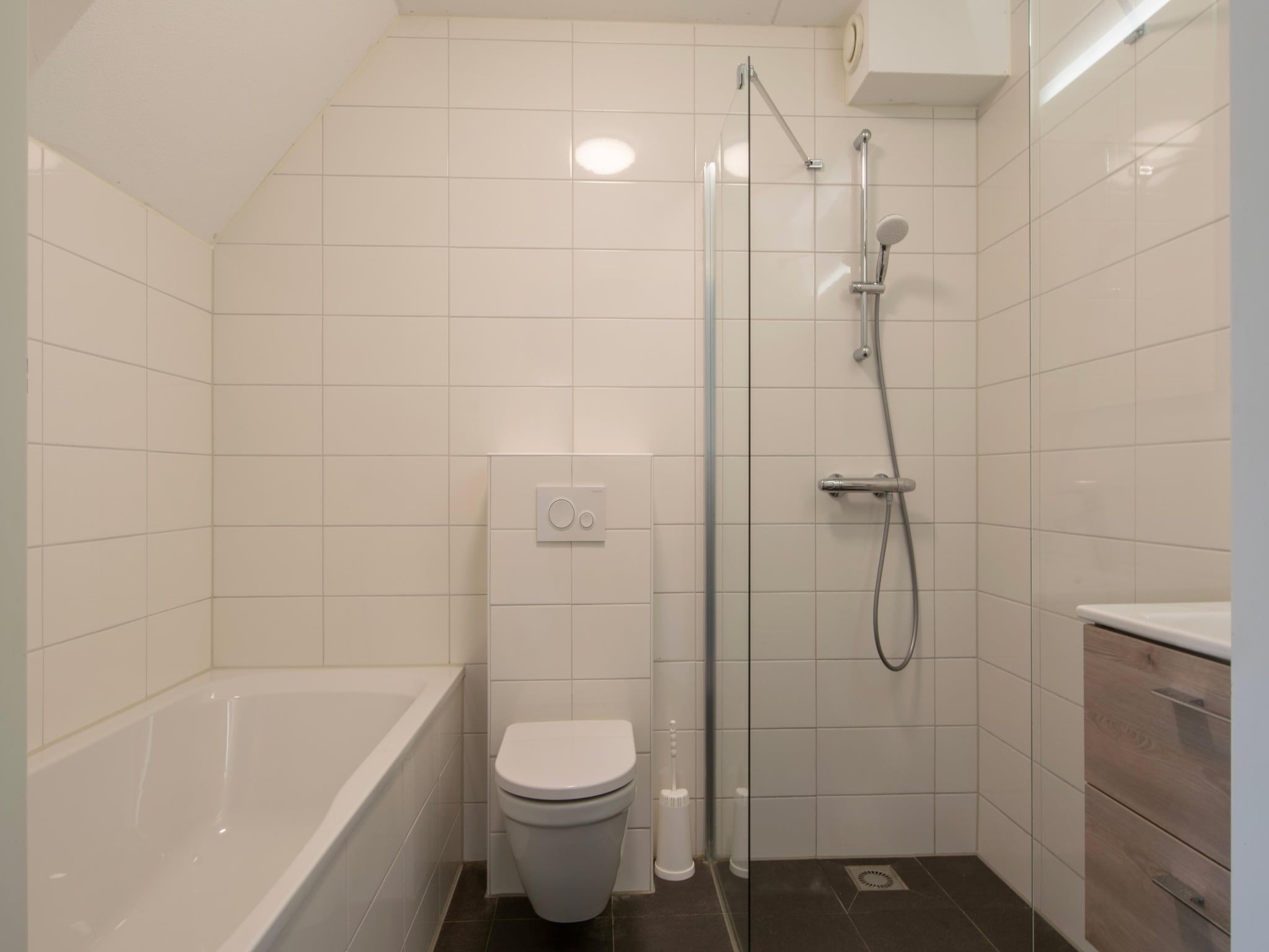 De badkamer van Vakantiepark de Soeten Haert 20 in Renesse