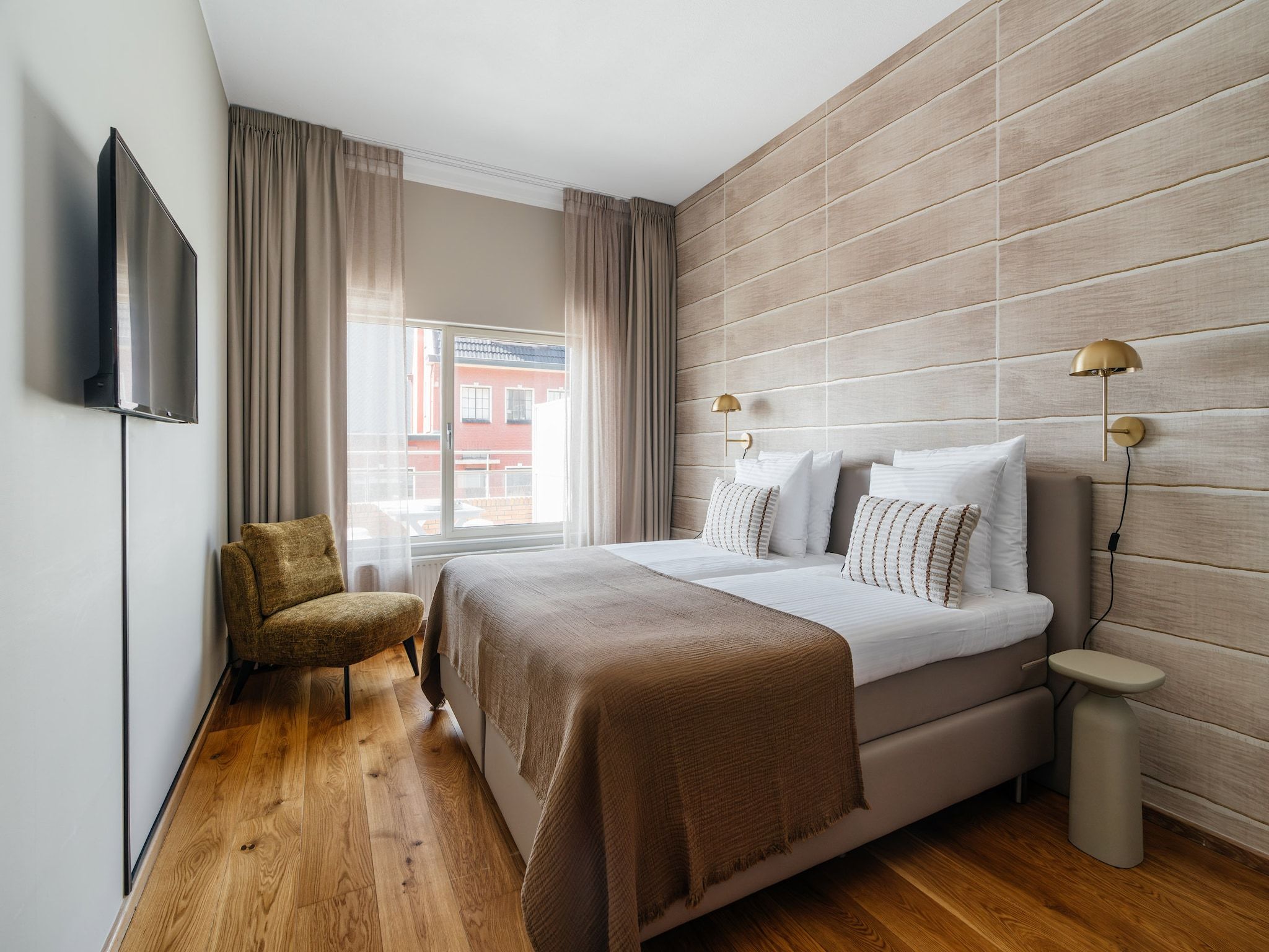 Een slaapkamer van Scheveningen Harbour 6B in Den Haag