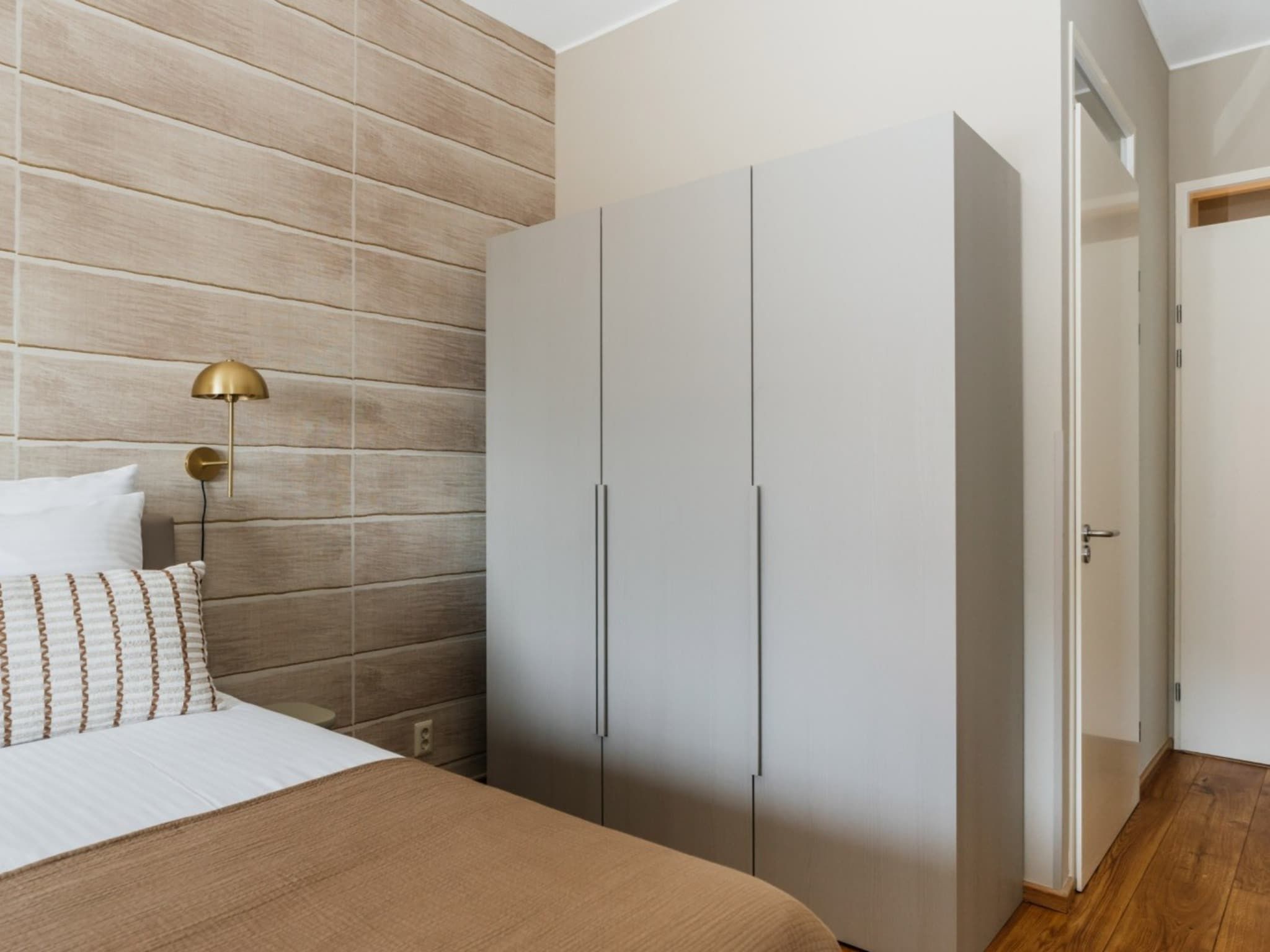 Een slaapkamer van Scheveningen Harbour 6B in Den Haag