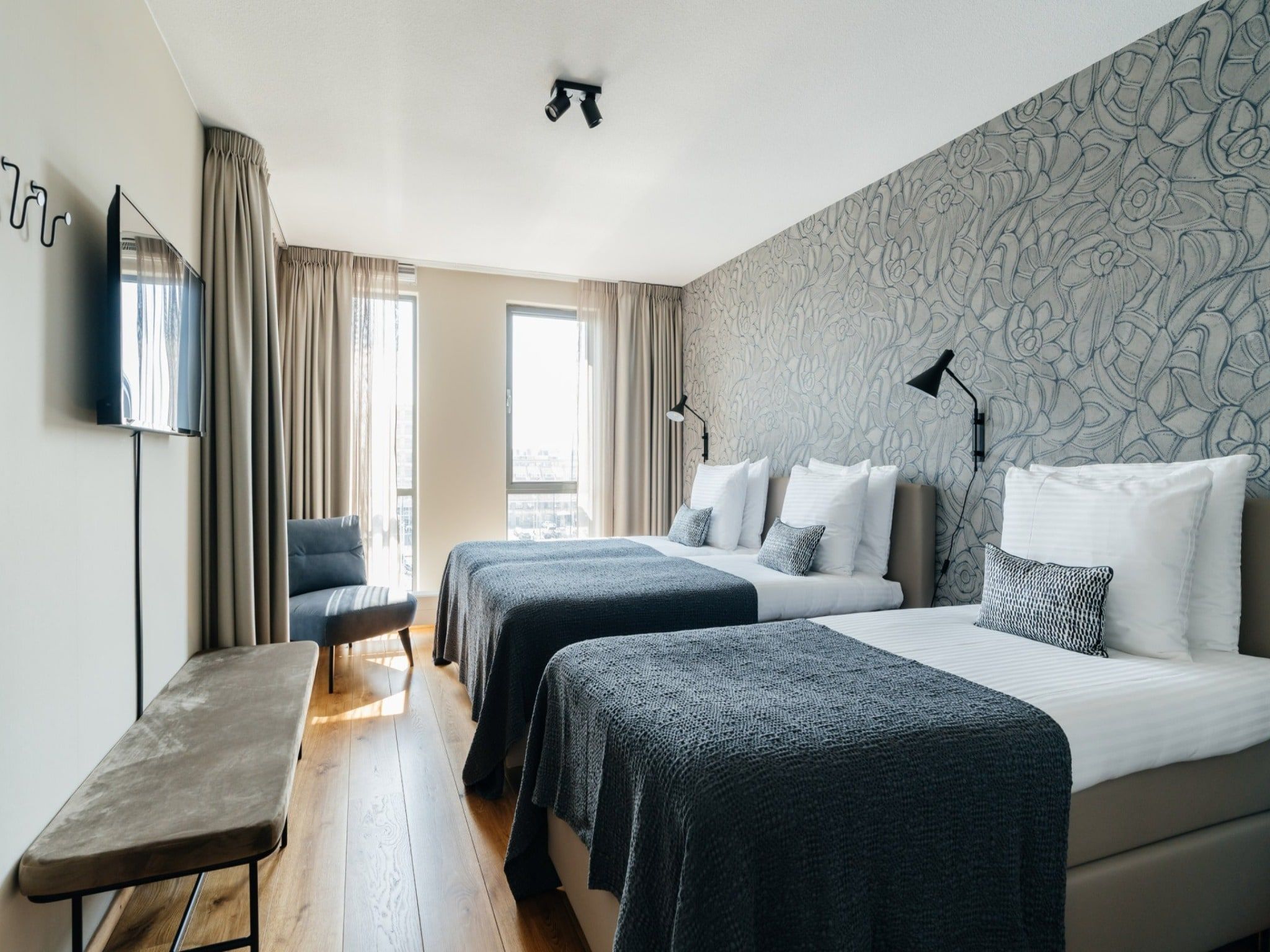 Een slaapkamer van Scheveningen Harbour 12 in Scheveningen