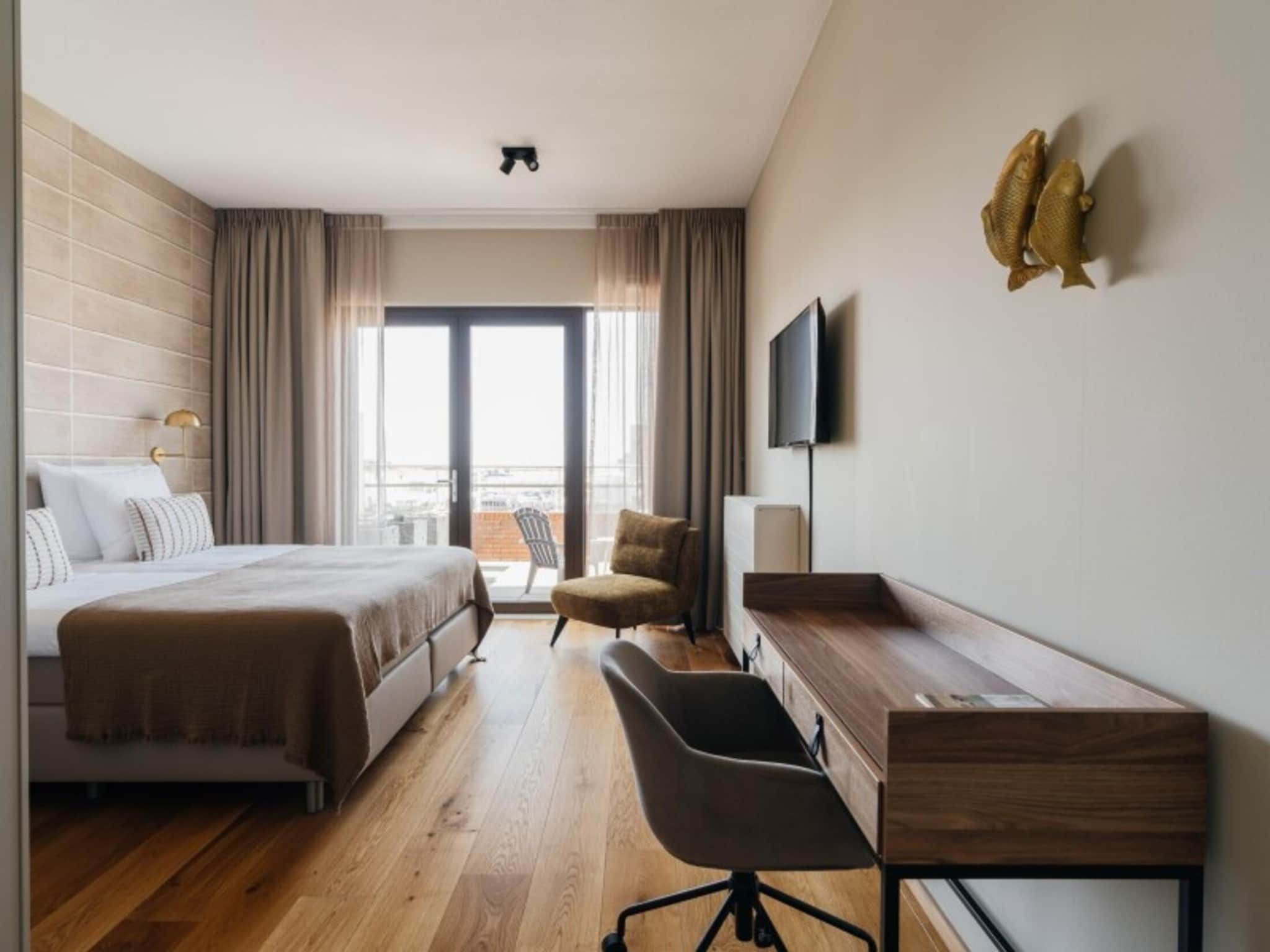 Een slaapkamer van Scheveningen Harbour 16 in Scheveningen