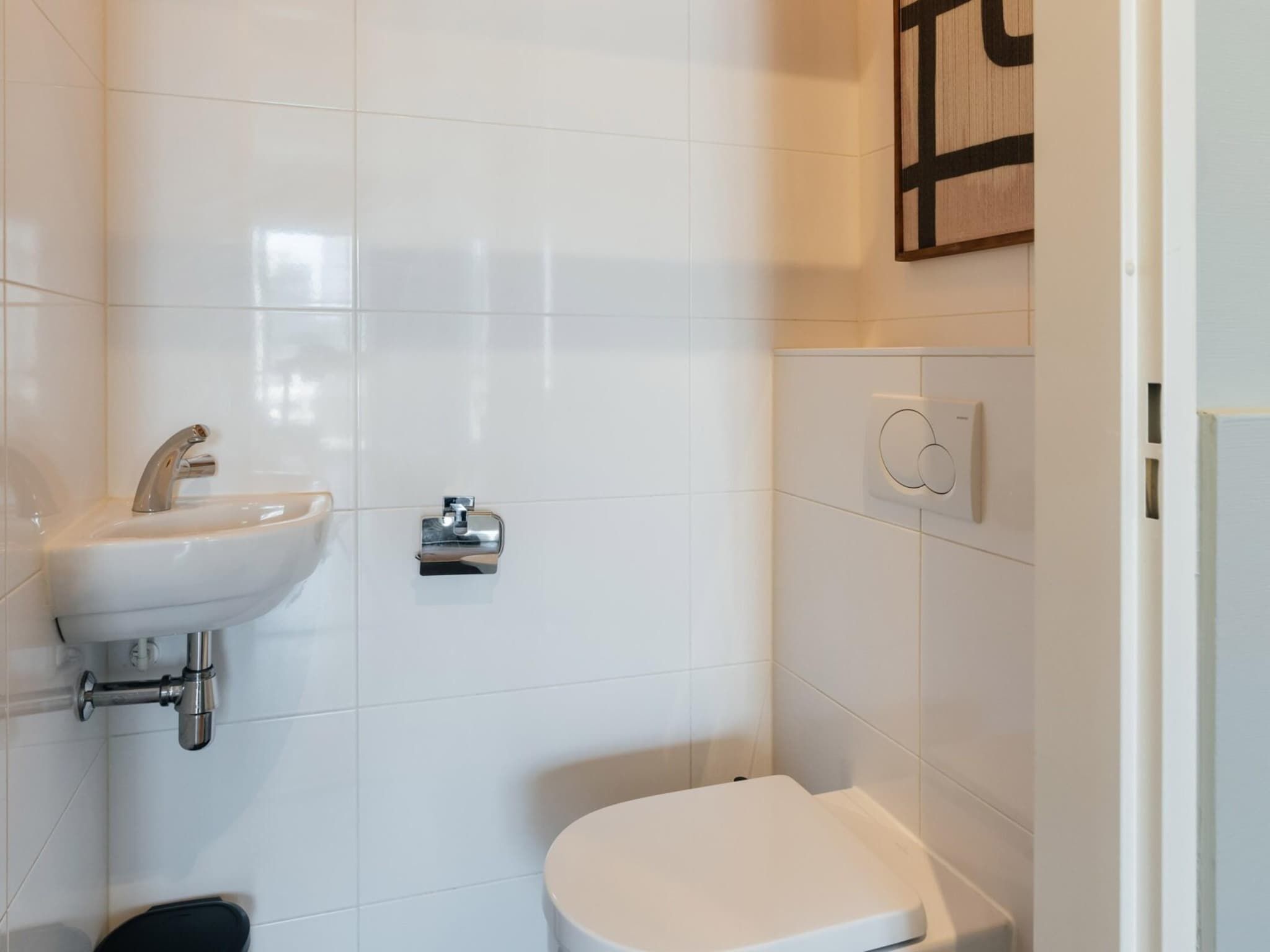 De badkamer van Scheveningen Harbour 16 in Scheveningen