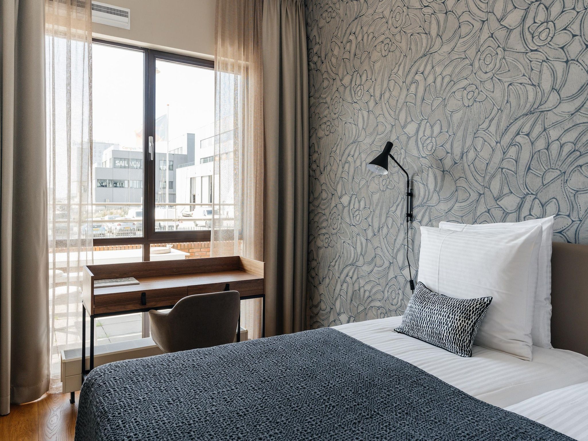 Een slaapkamer van Scheveningen Harbour 18C in Scheveningen