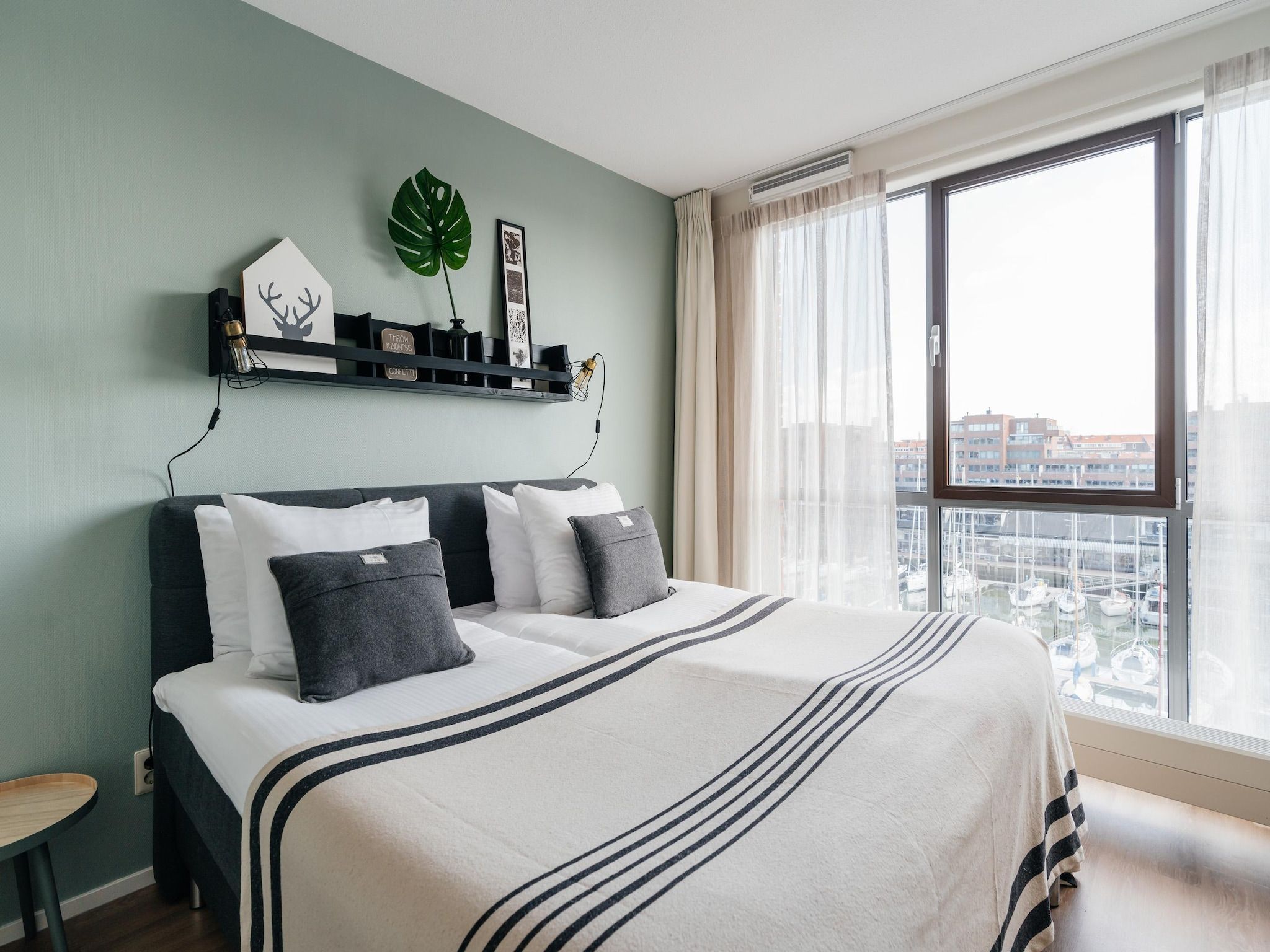 Een slaapkamer van Scheveningen Harbour 80B in Scheveningen