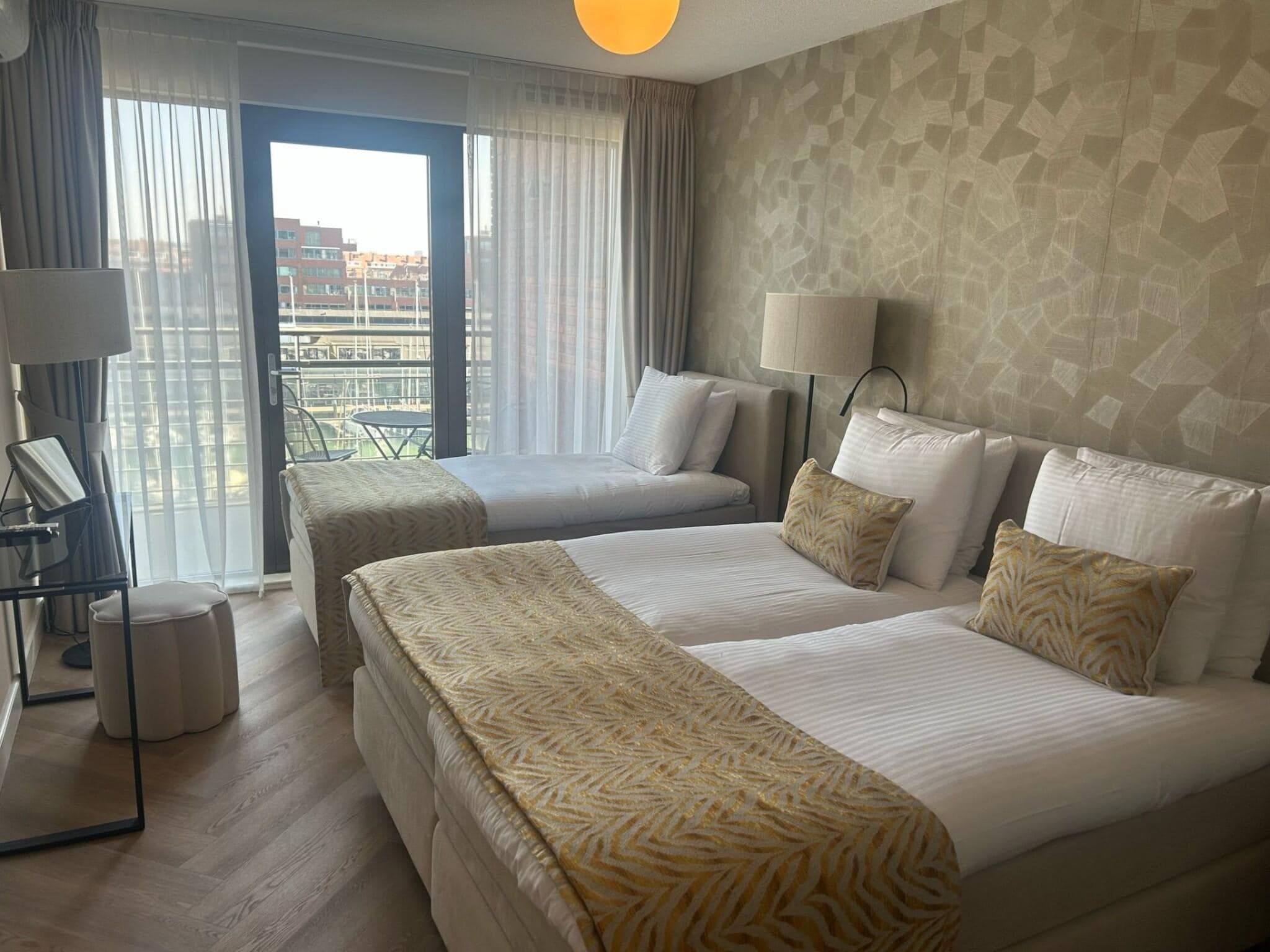 Een slaapkamer van Scheveningen Harbour 66A in Scheveningen