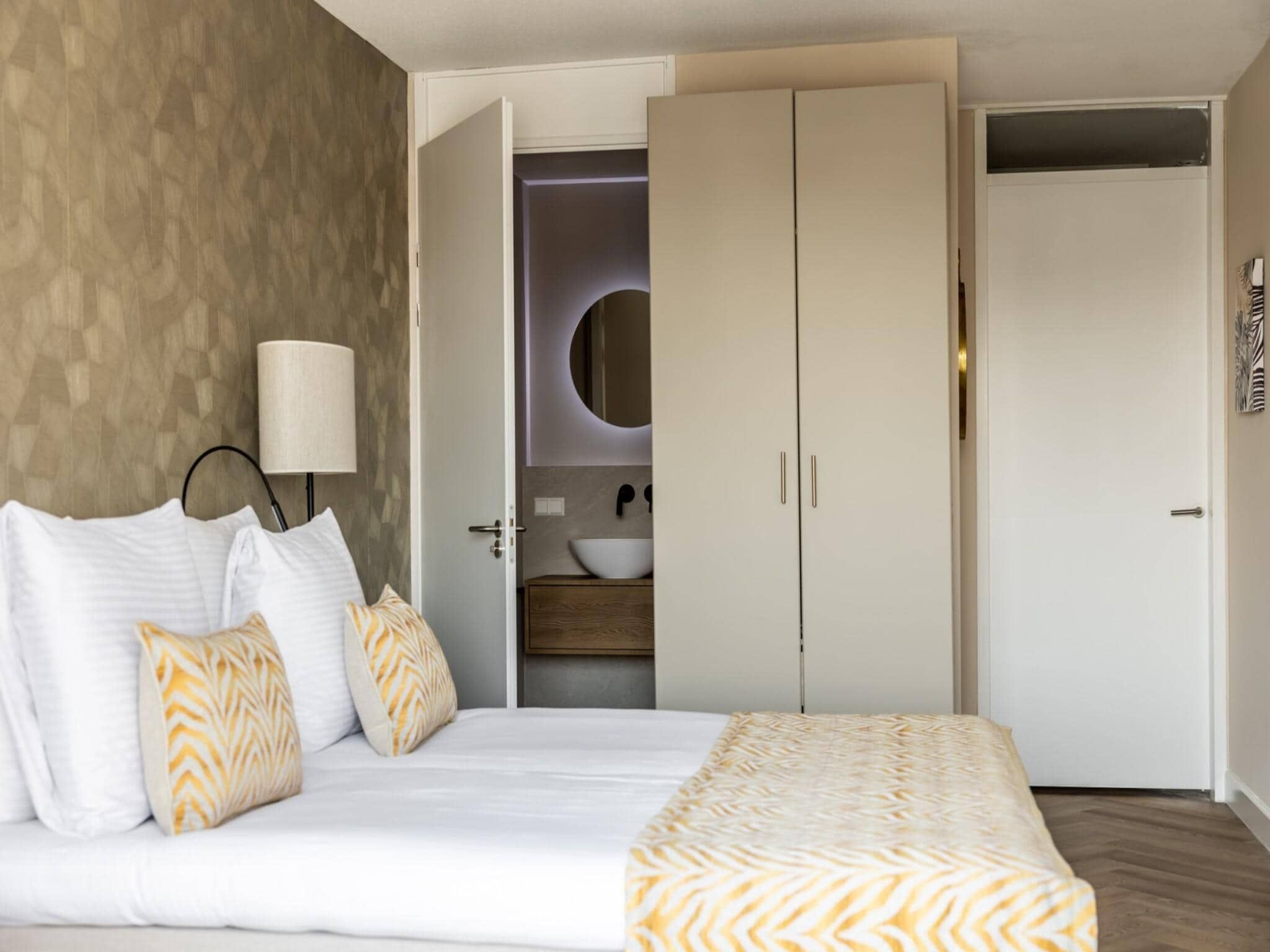 Een slaapkamer van Scheveningen Harbour 66A in Scheveningen
