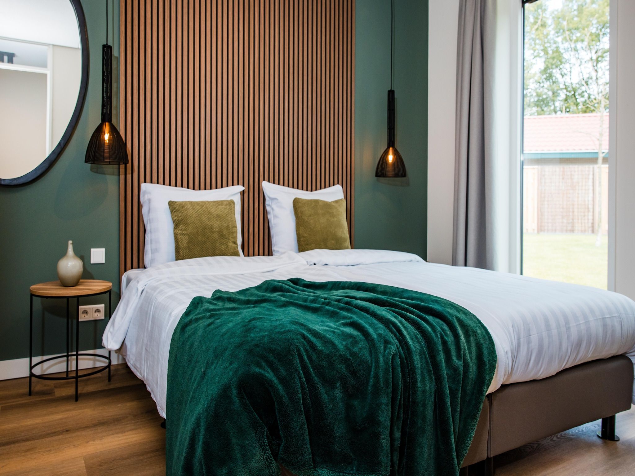 Een slaapkamer van Dwergarend 17-26 in Voorthuizen