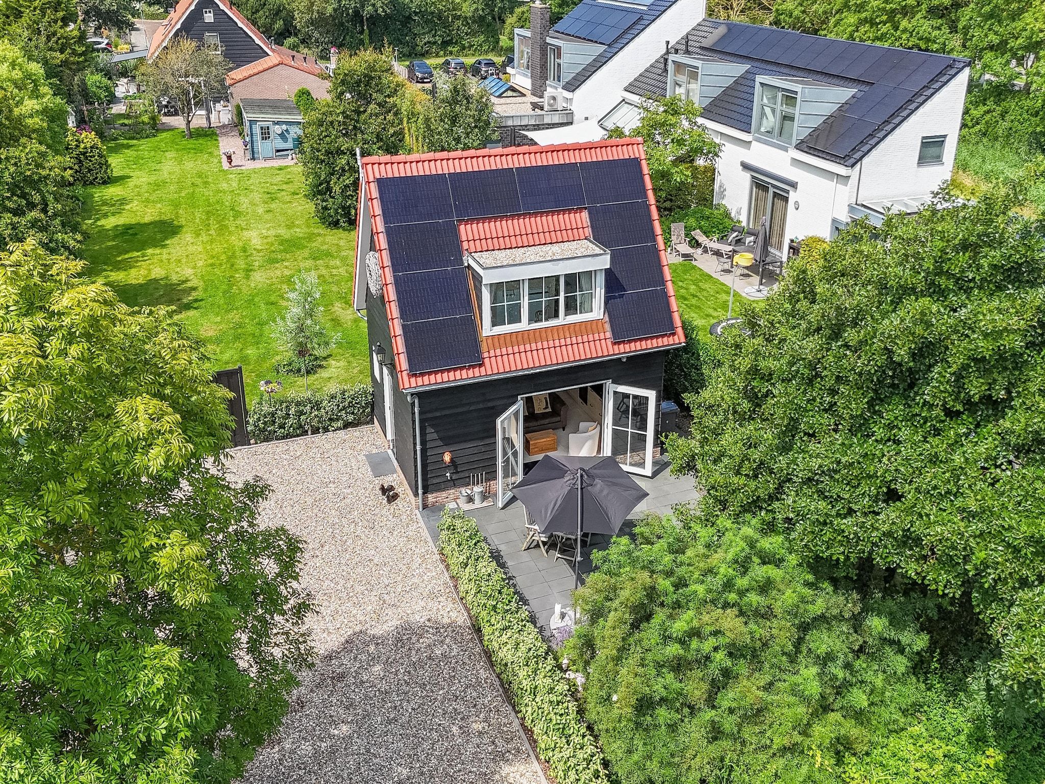 De buitenkant van Sloestraat 38  Zoutelande 'Het Koetshuys' in Zoutelande