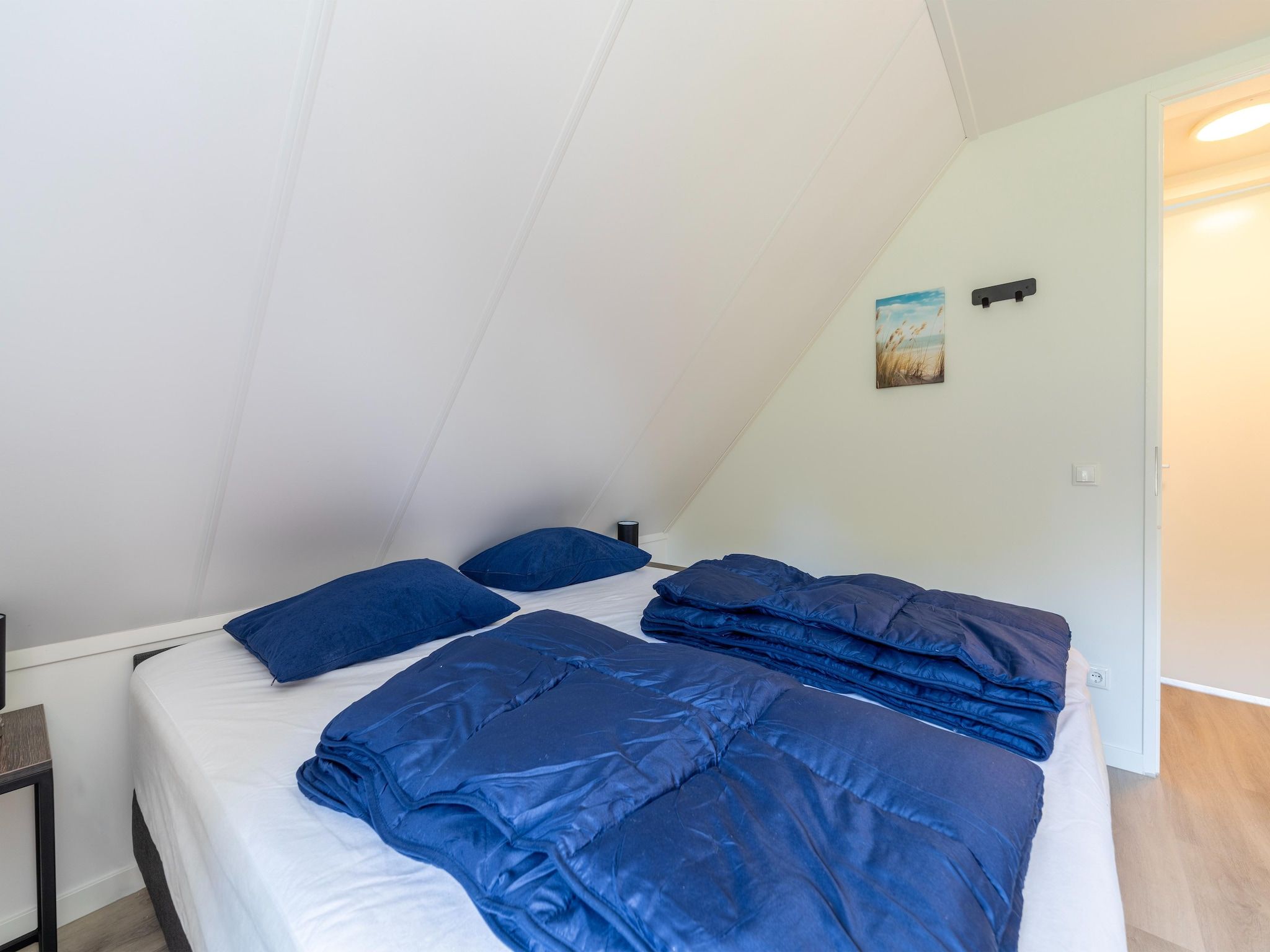 Een slaapkamer van Kuifduiker 3 in Simonshaven