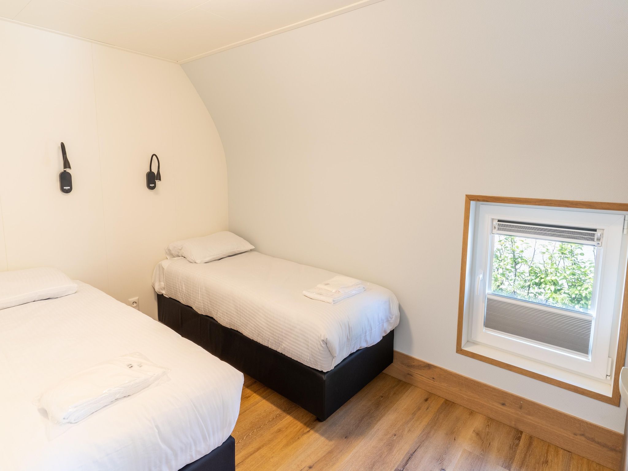 Een slaapkamer van 't Landgoed Baars 1 in Baars