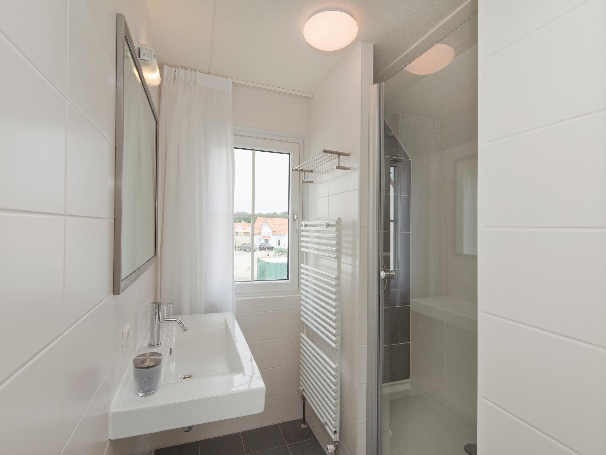 De badkamer van Noordzee Residence Cadzand-Bad 34 in Cadzand-Bad