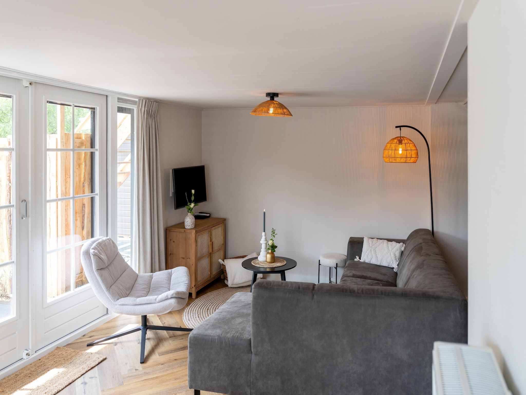 De woonkamer van Luxe vakantiehuis Veluwe met Wellness in Veluwe