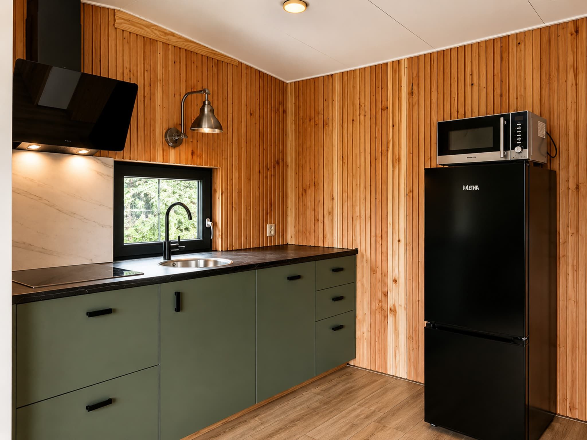 De keuken van Knus chalet In een rustige omgeving met vijver in Stegeren