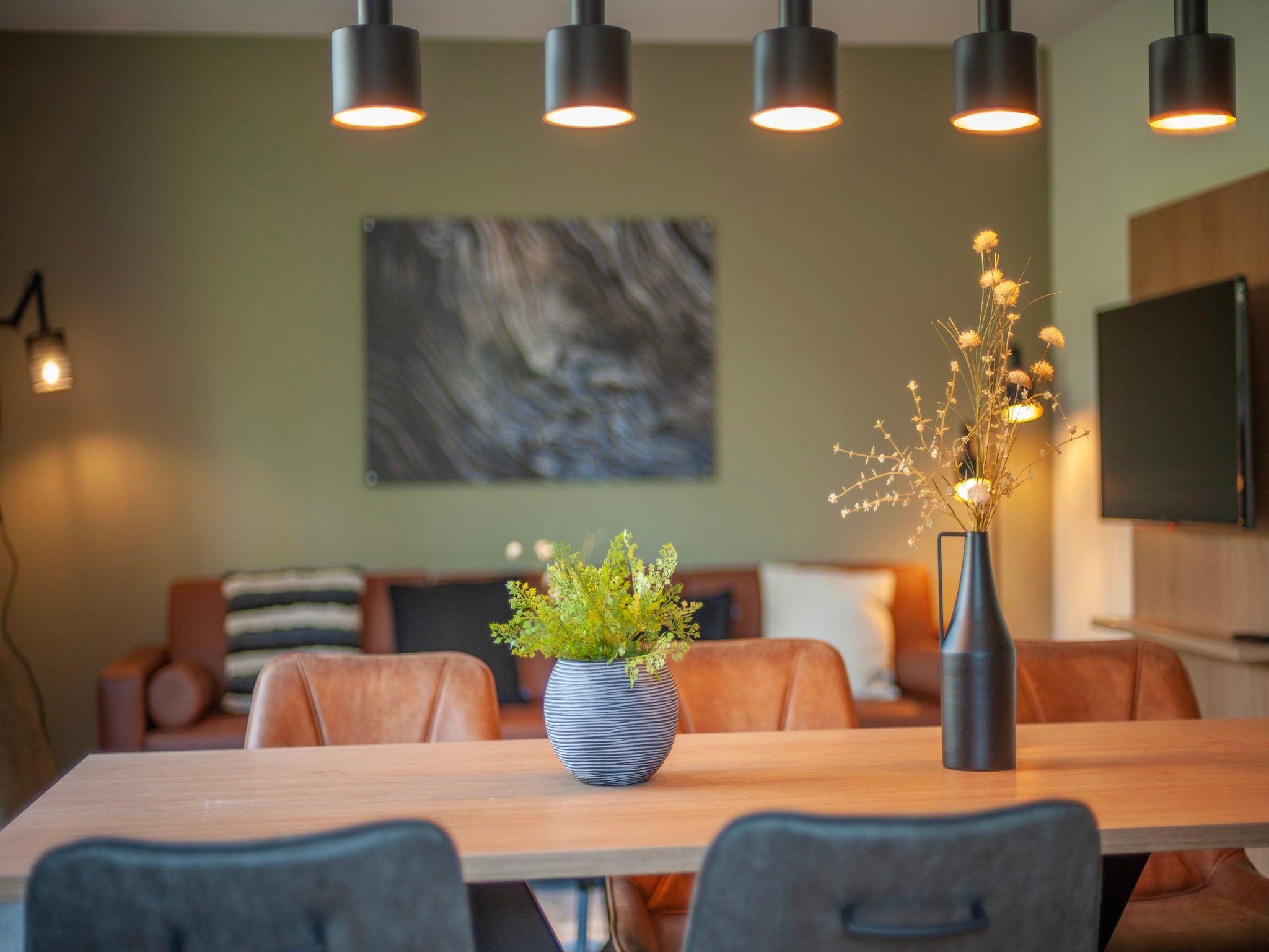 De woonkamer van Vakantiepark de Katjeskelder 25 in Oosterhout