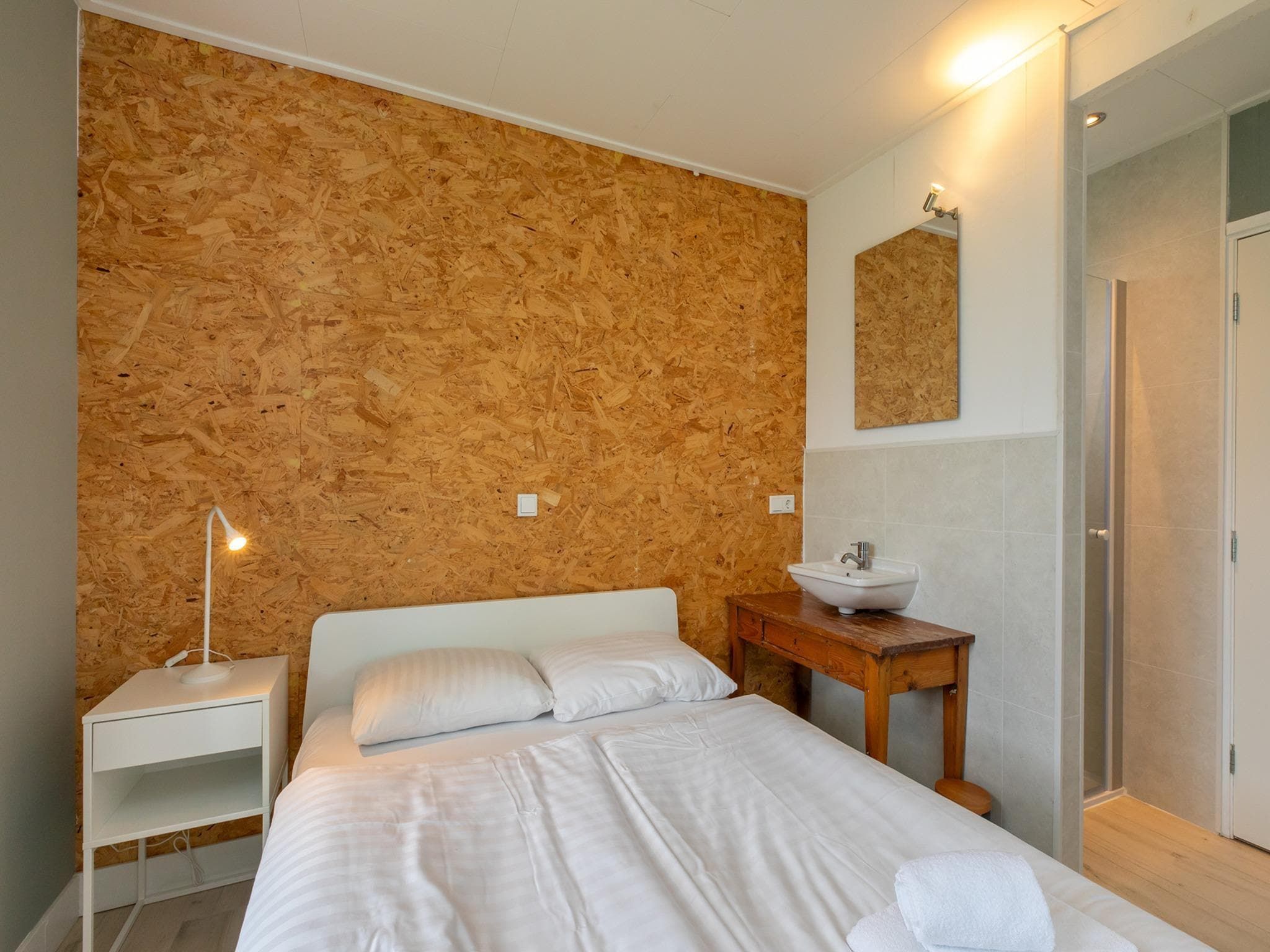 Een slaapkamer van Vakantiewoning - Horizon 14  Renesse in Renesse