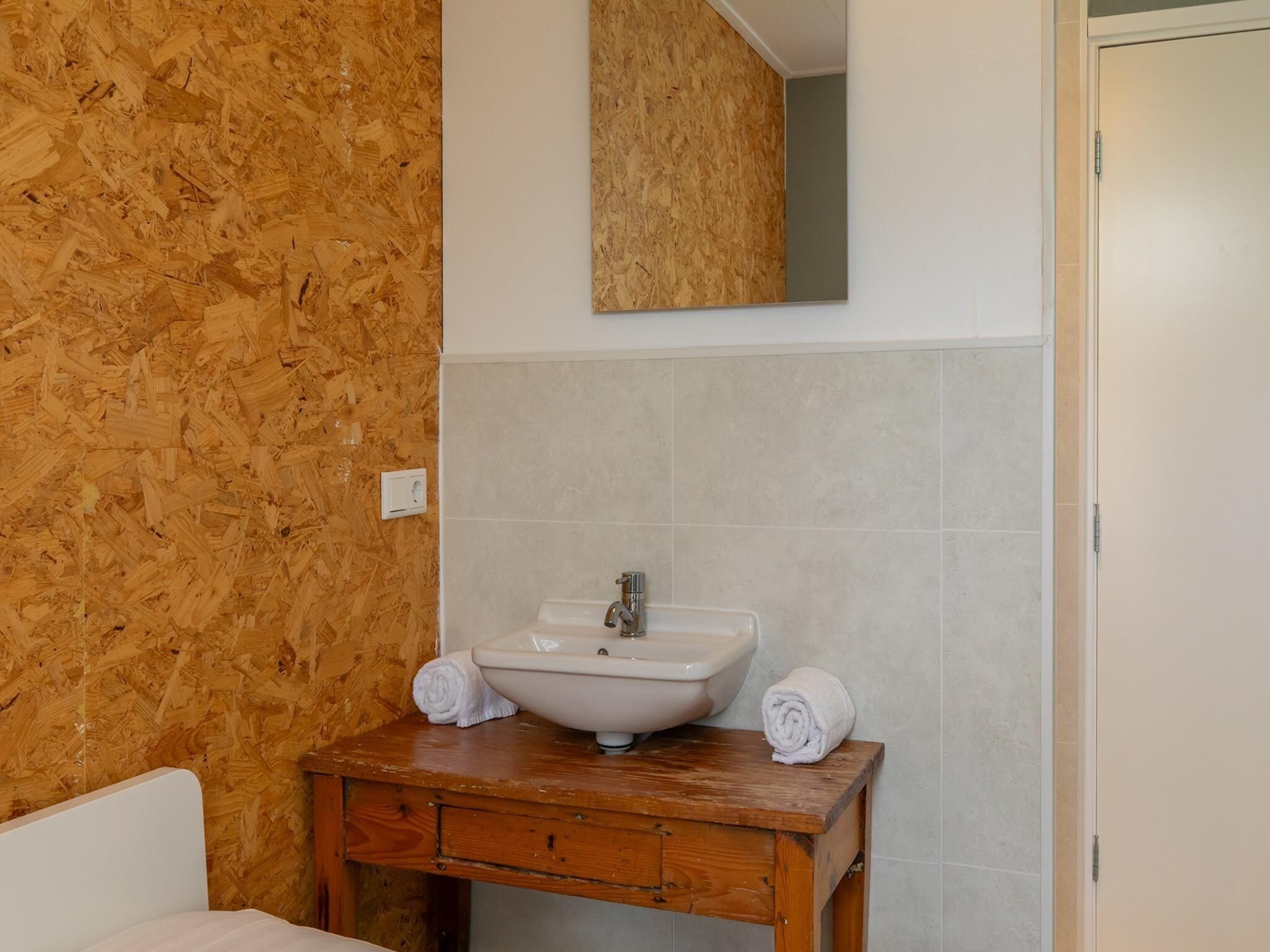 De badkamer van Vakantiewoning - Horizon 14  Renesse in Renesse