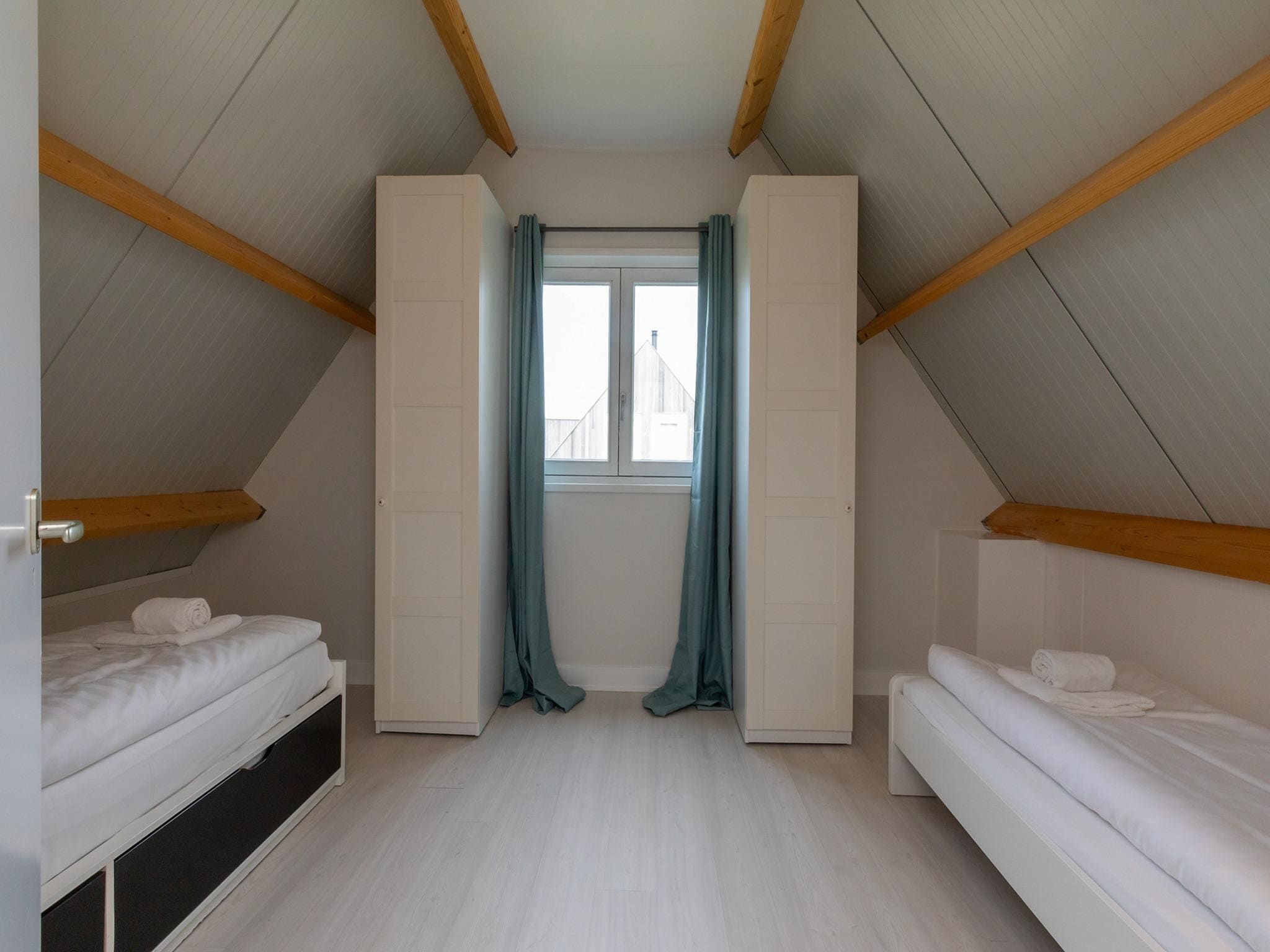 Een slaapkamer van Vakantiewoning - Horizon 14  Renesse in Renesse