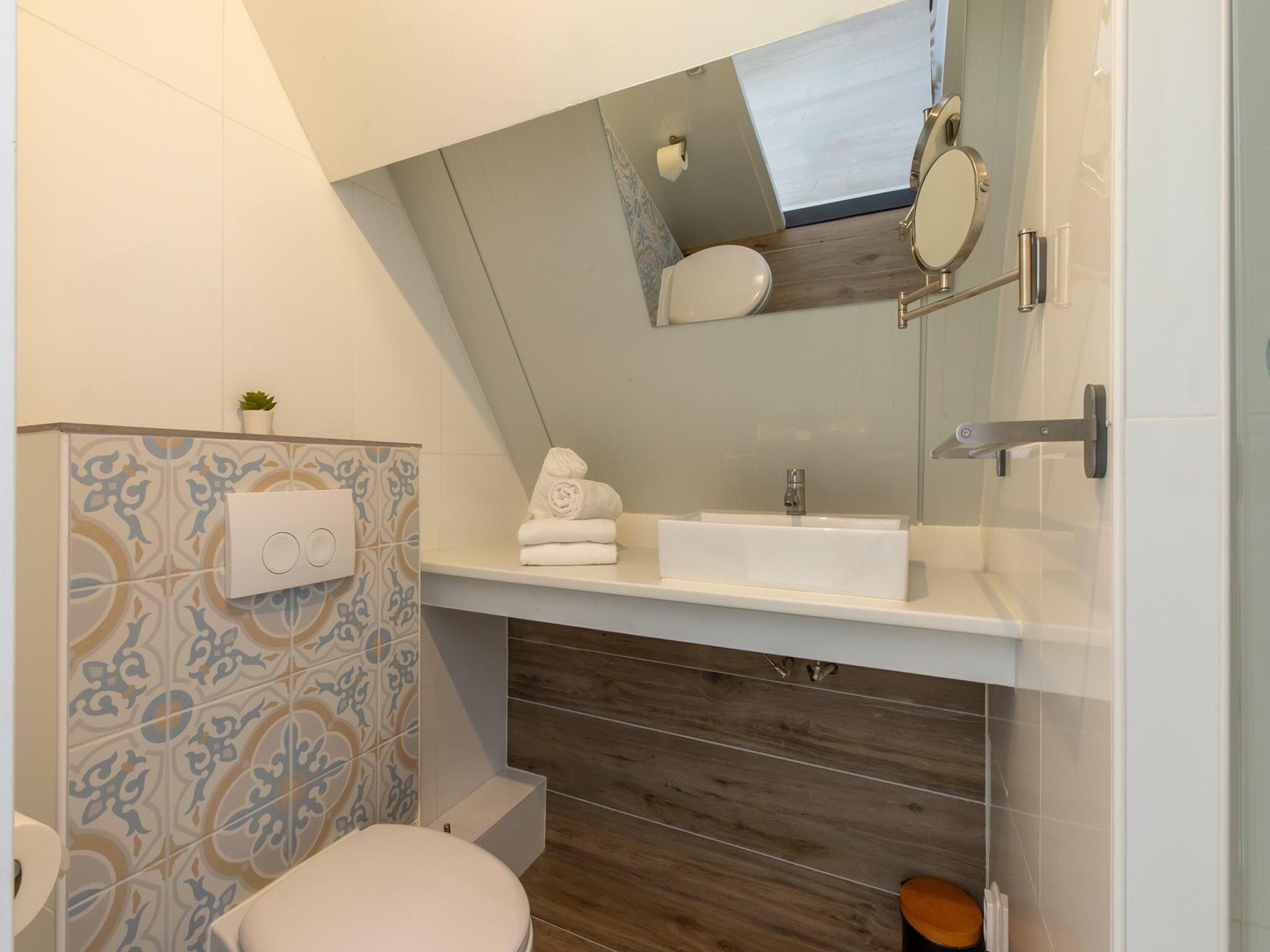 De badkamer van Vakantiewoning - Horizon 14  Renesse in Renesse