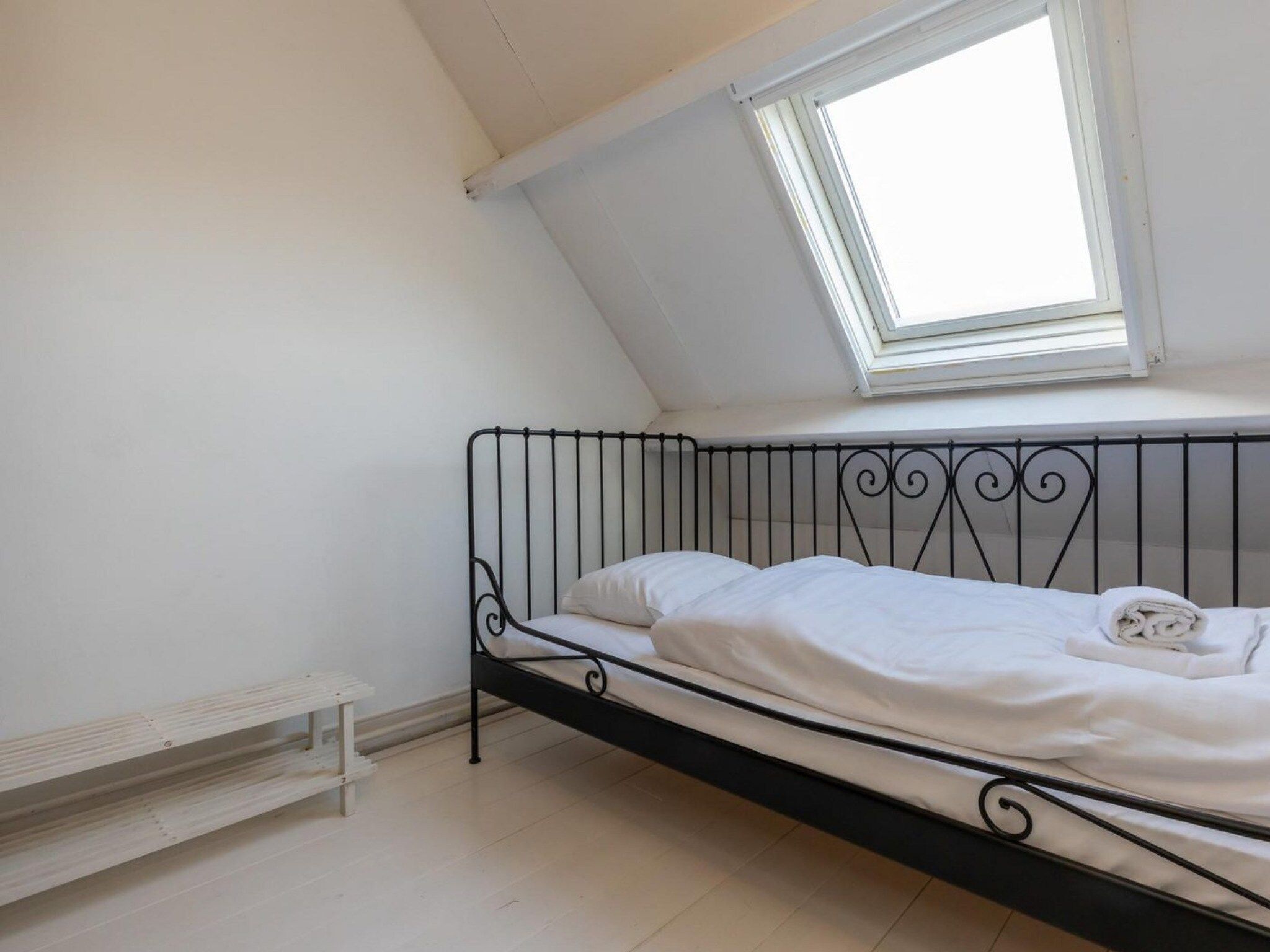 Een slaapkamer van Duinweg 117-14 in Zoutelande