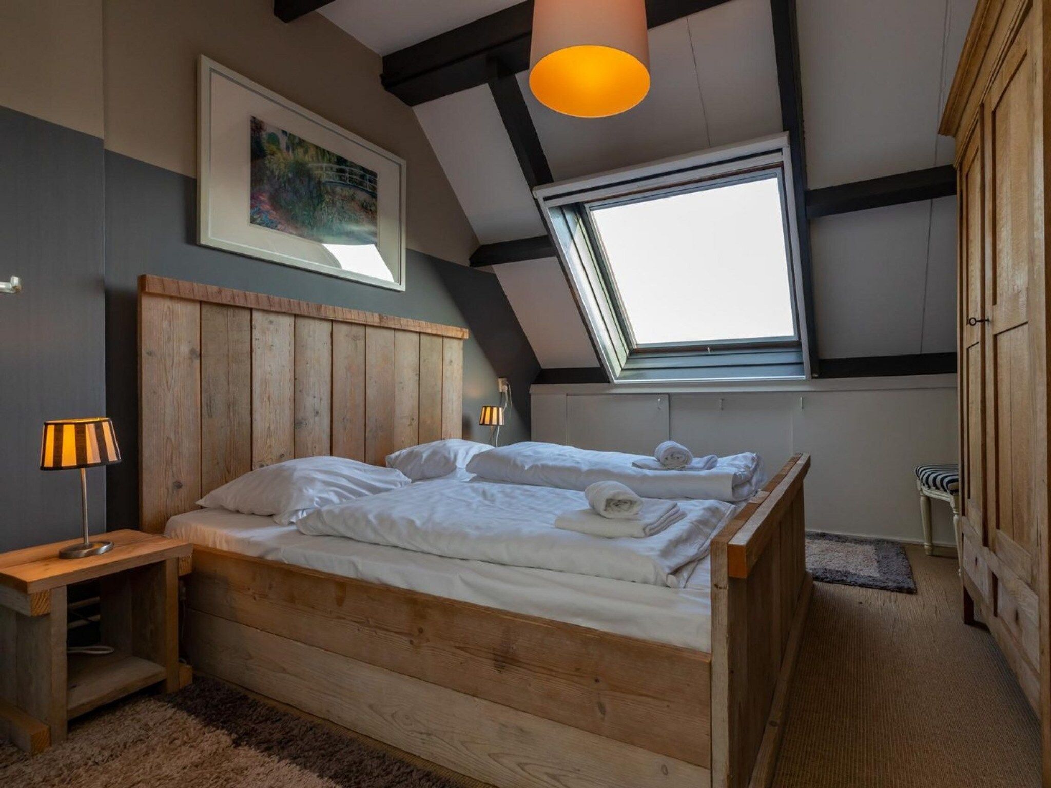 Een slaapkamer van Duinweg 117-14 in Zoutelande