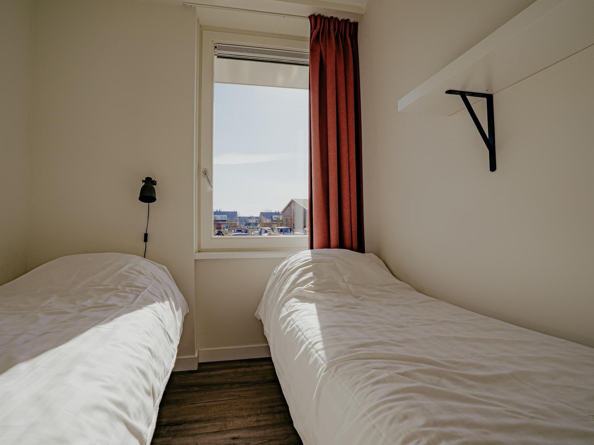 Een slaapkamer van Waterpark de Meerparel 14 in Uitgeest