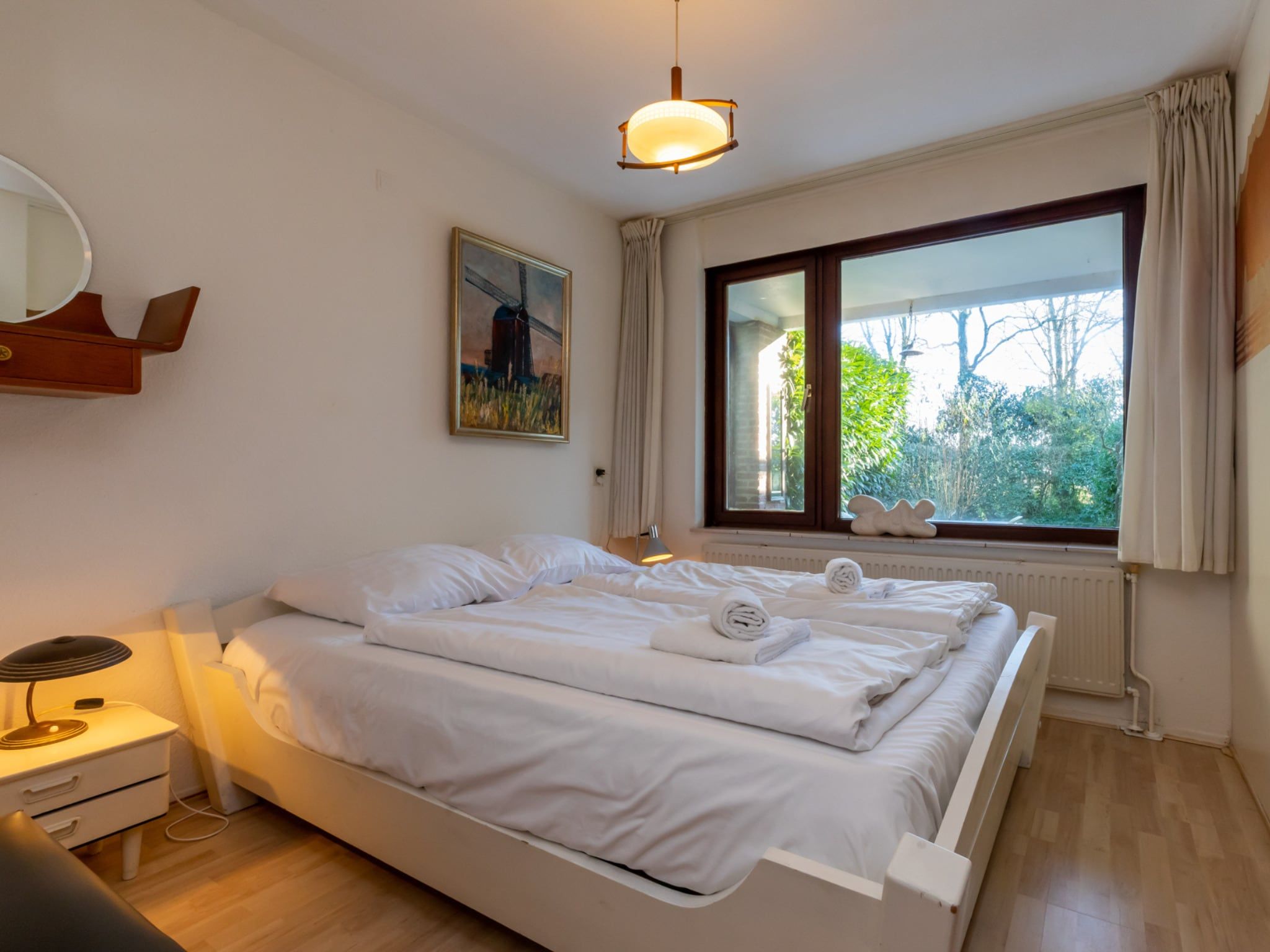 Een slaapkamer van Nescio in Veere