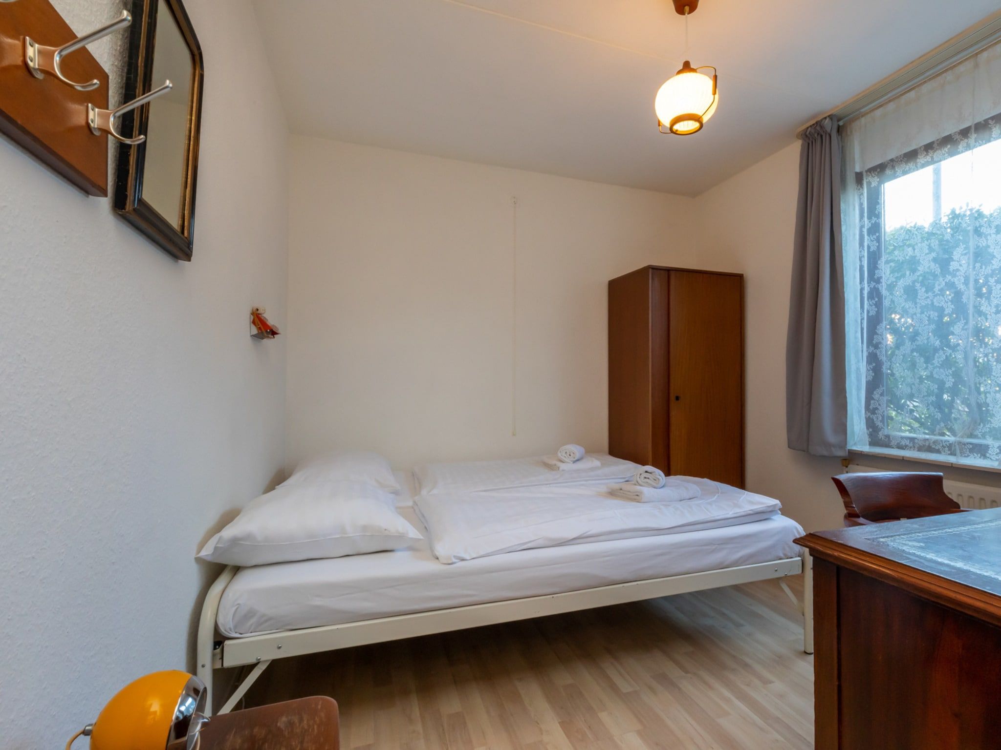 Een slaapkamer van Nescio in Veere