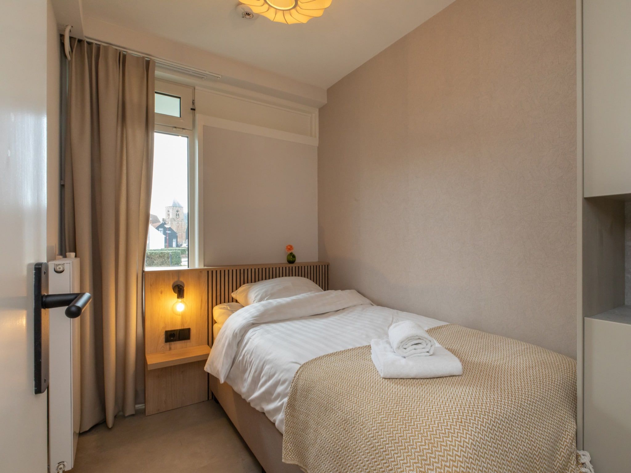 Een slaapkamer van Zoutelande 'Kurhaus appartement nr 1 in Zoutelande