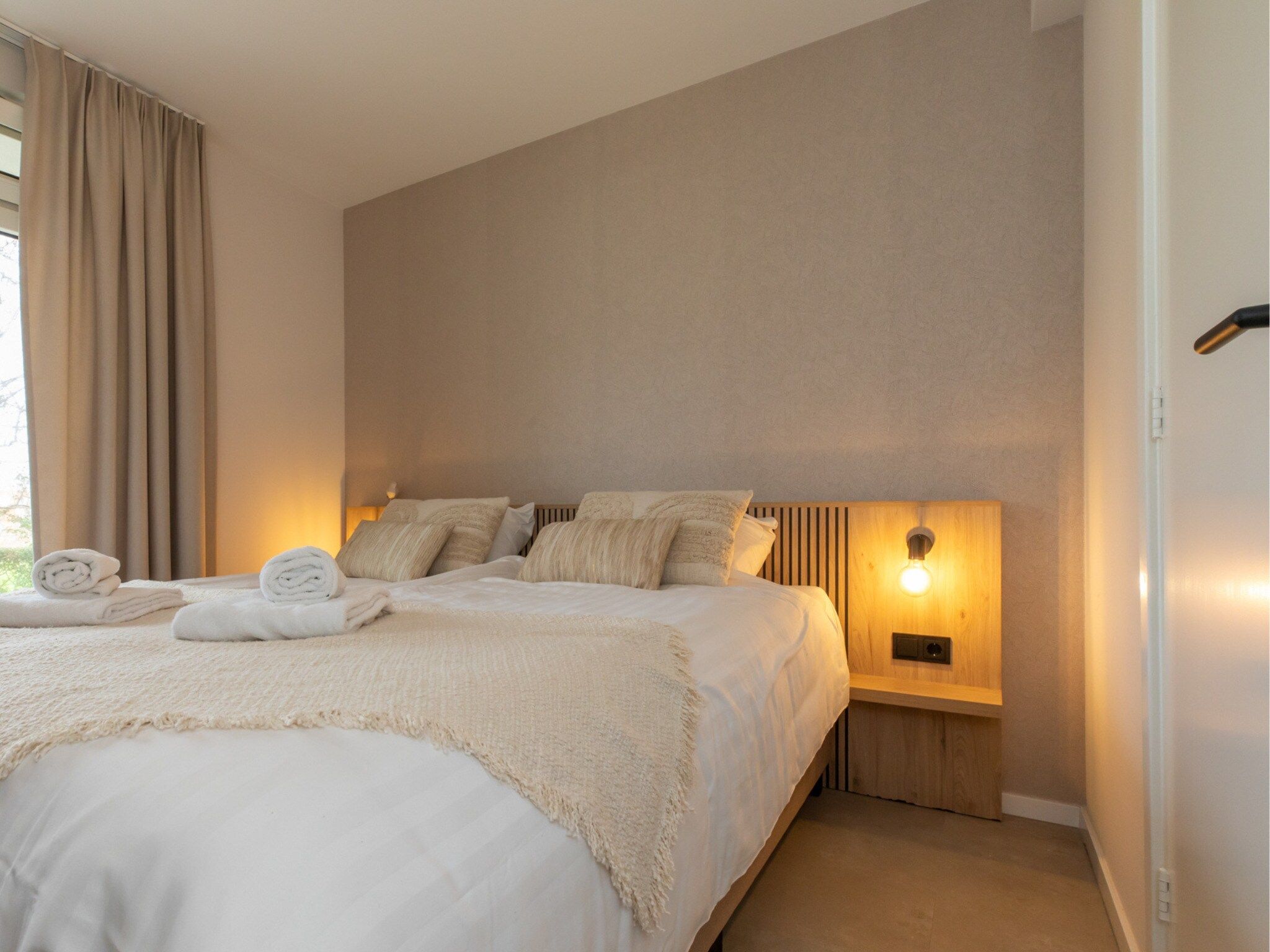 Een slaapkamer van Nieuwstraat 1  Zoutelande 'Kurhaus - 2 in Zoutelande