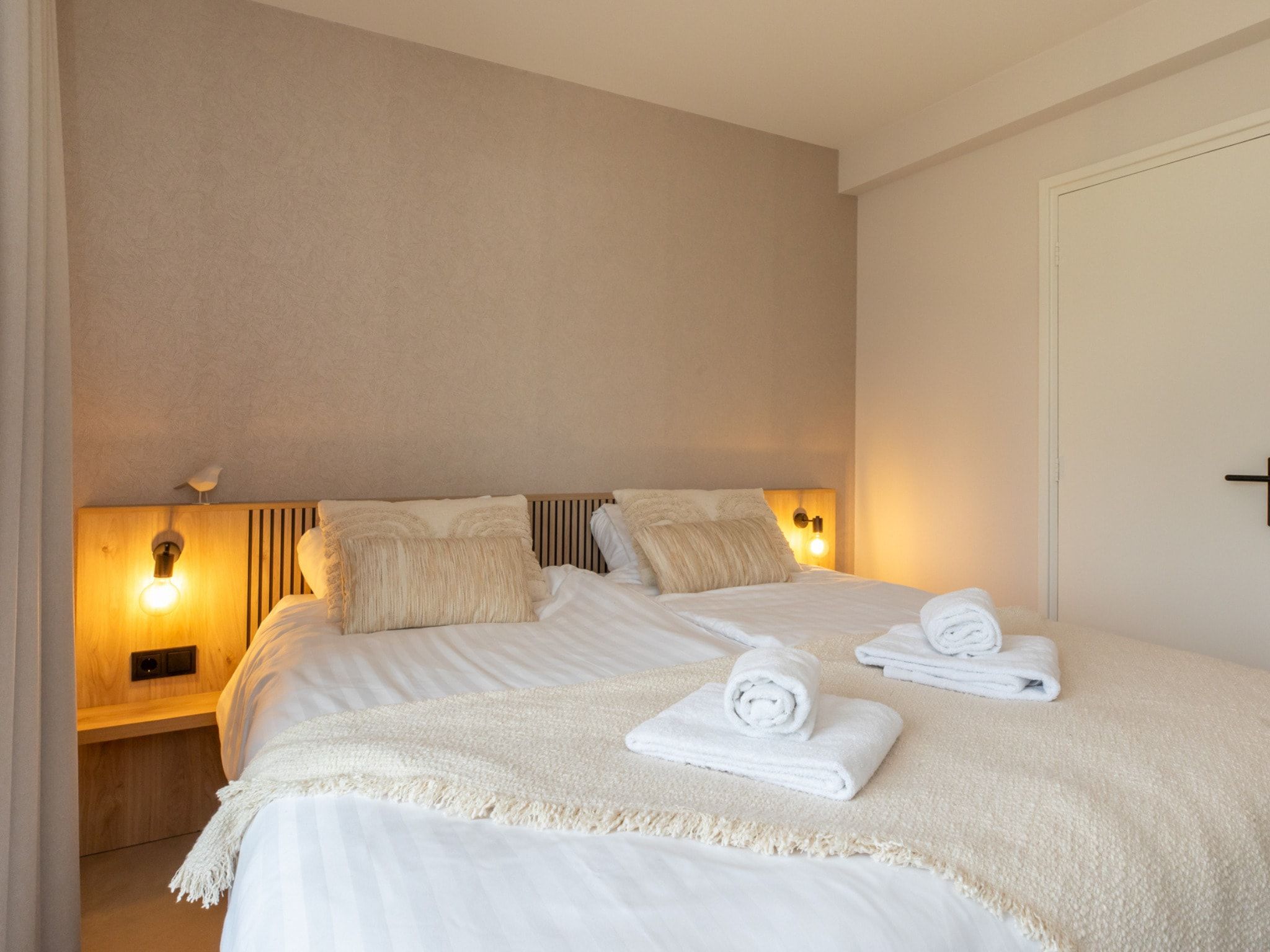 Een slaapkamer van Nieuwstraat 1  Zoutelande 'Kurhaus - 4 met sauna in Zoutelande