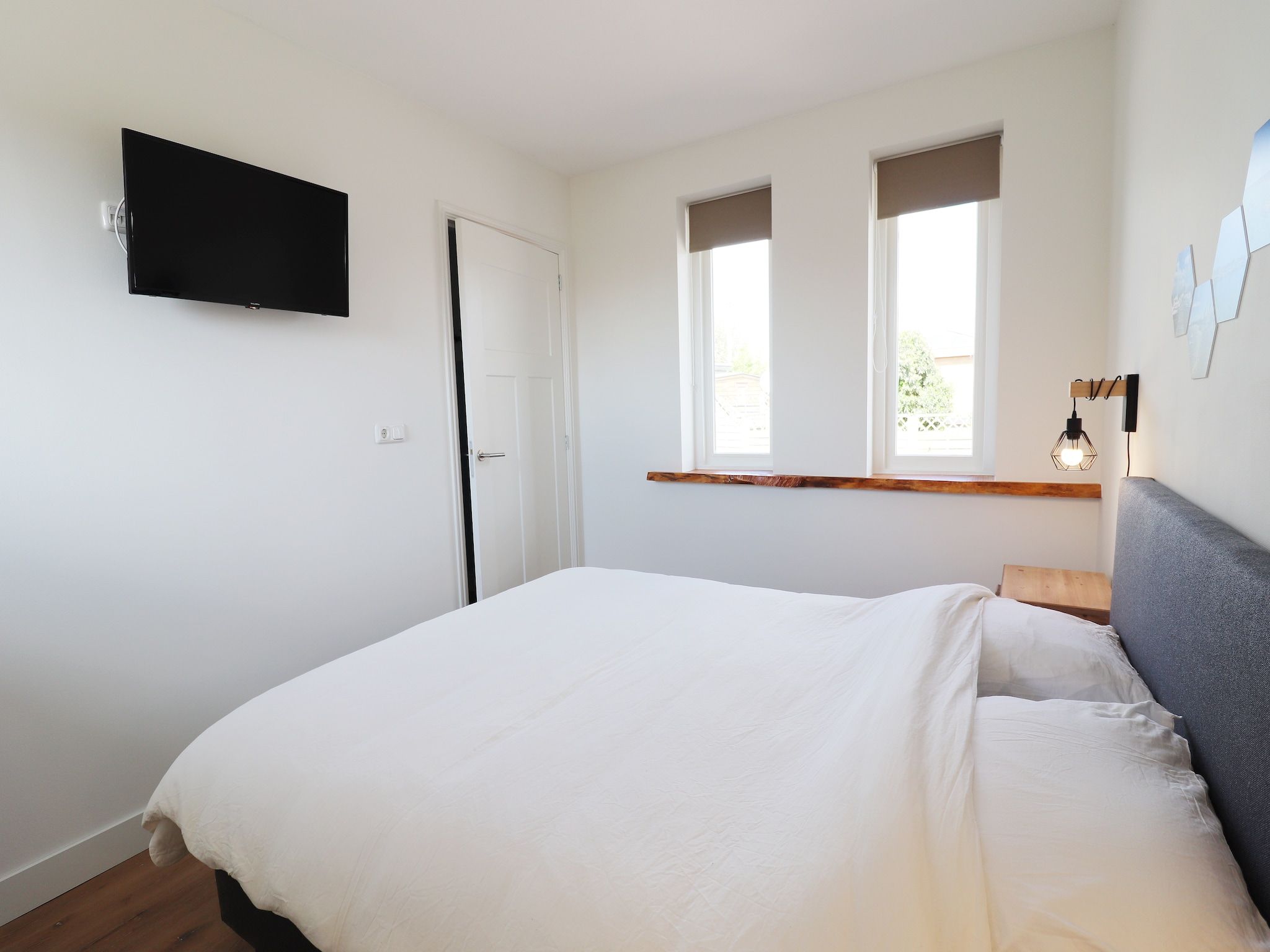 Een slaapkamer van Grote Siege 44 in Anjum