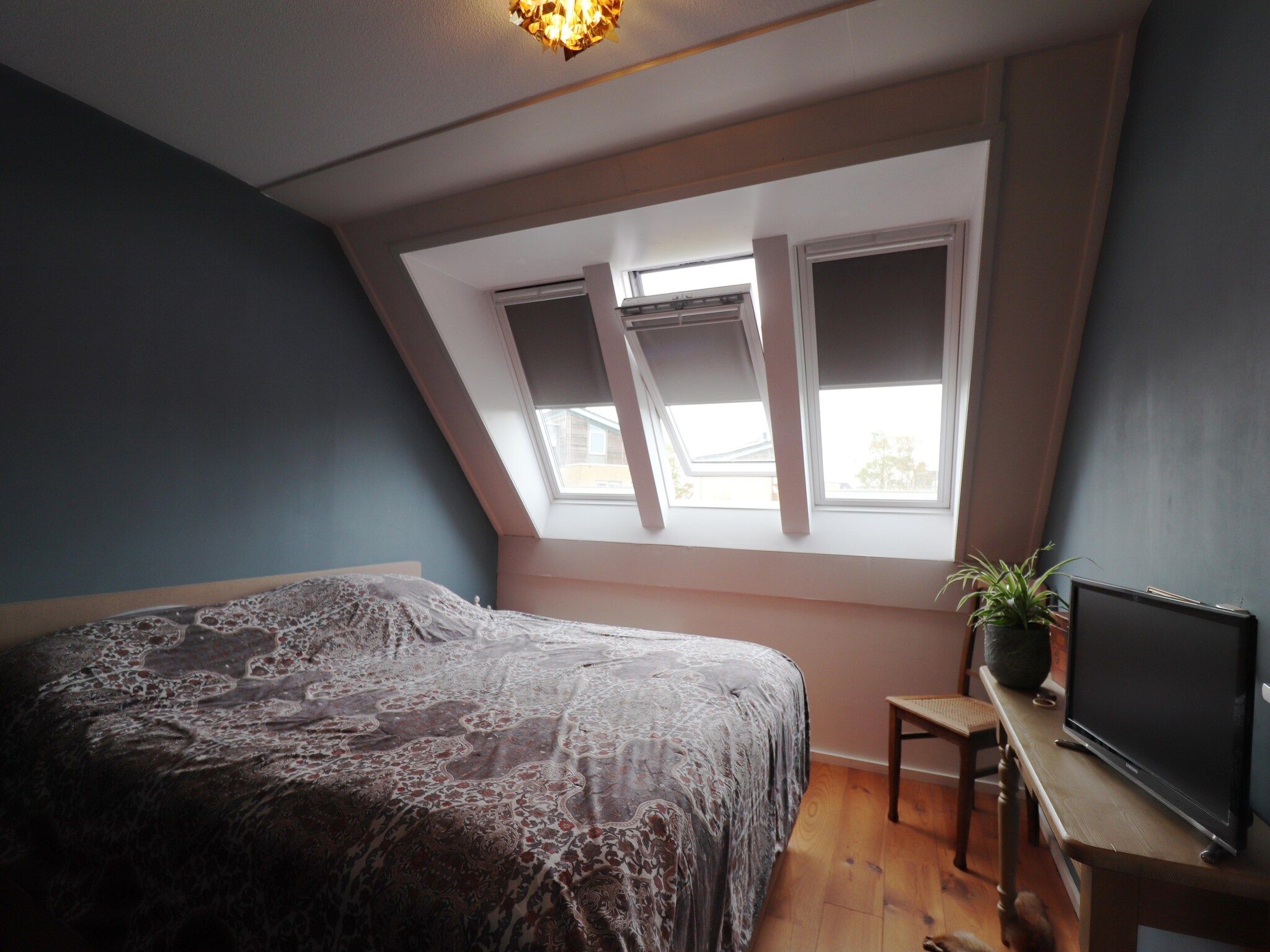 Een slaapkamer van Vakantiehuis in zonnig Grou in Gou