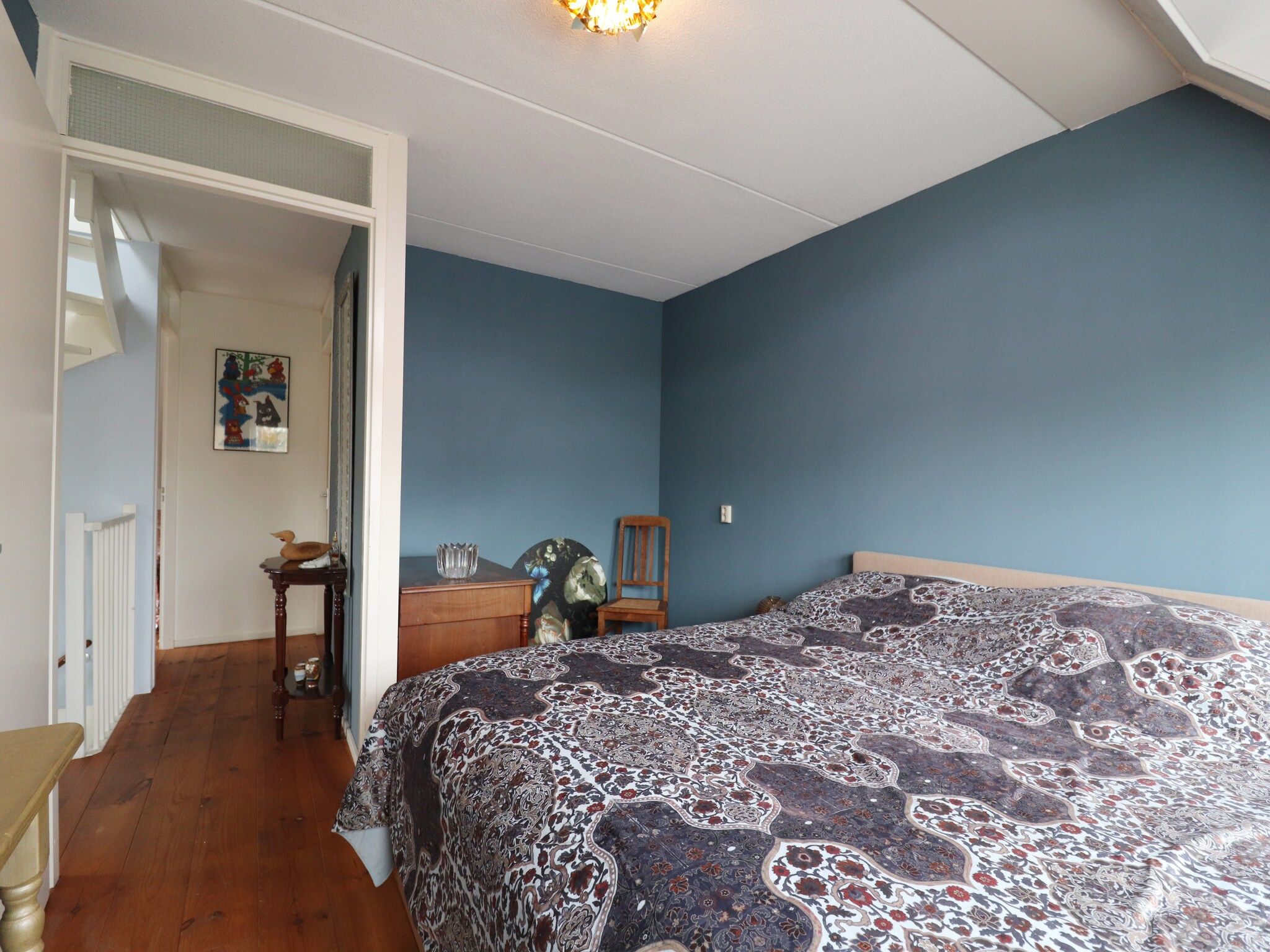 Een slaapkamer van Vakantiehuis in zonnig Grou in Gou