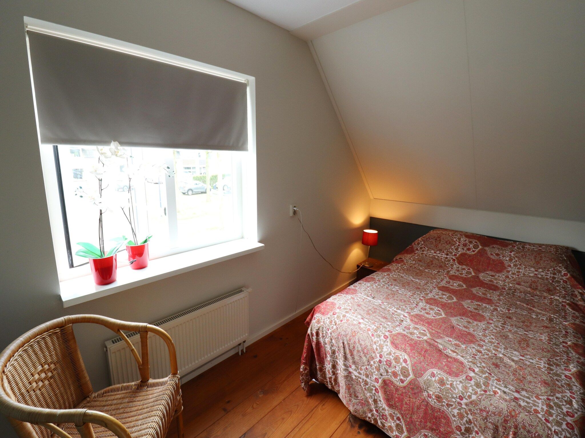 Een slaapkamer van Vakantiehuis in zonnig Grou in Gou