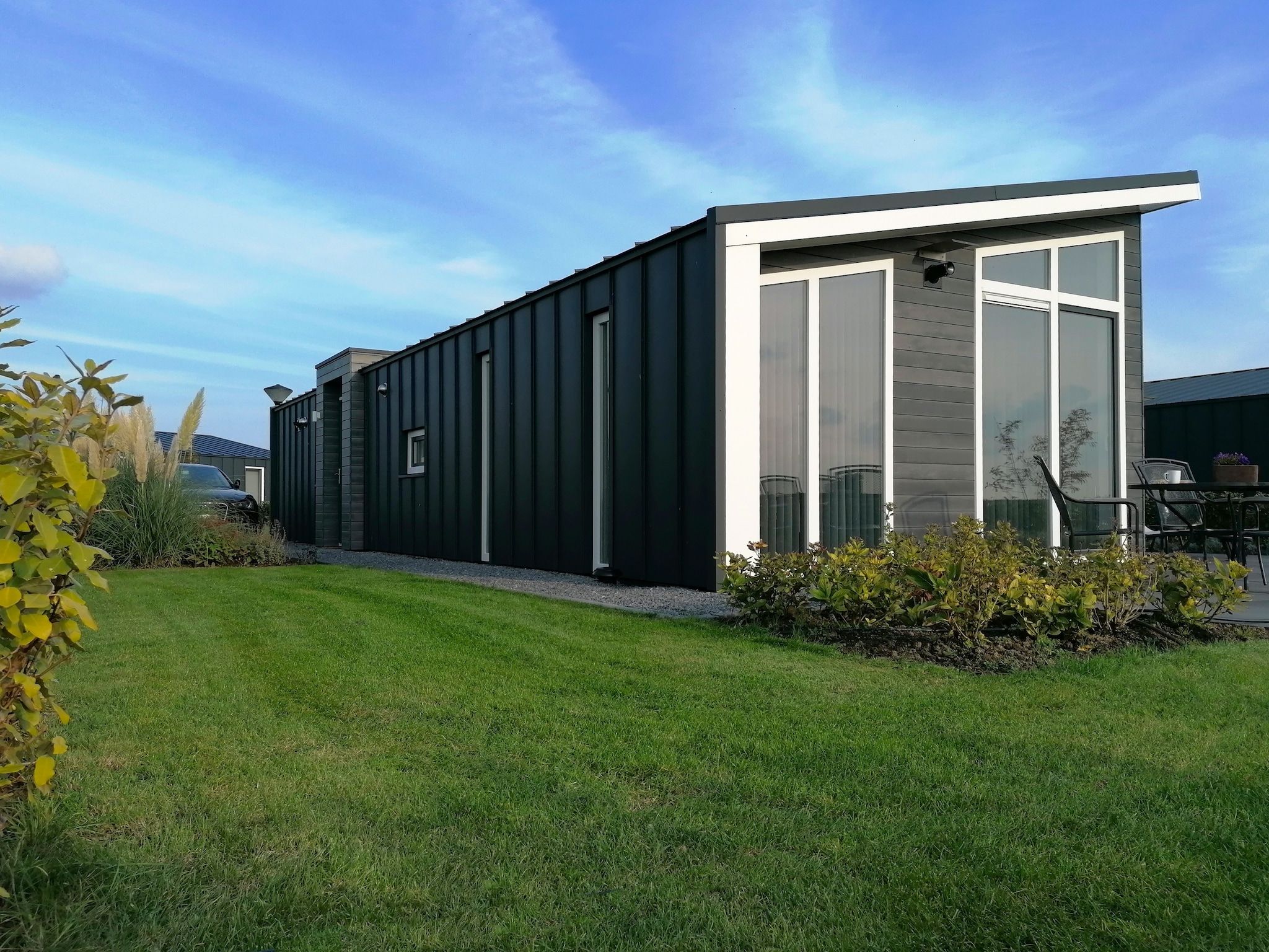 De tuin van Water Resort Oosterschelde 45 in Wemeldinge