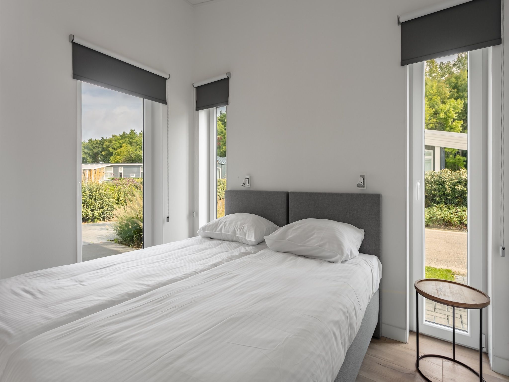 Een slaapkamer van Water Resort Oosterschelde 80 in Wemeldinge