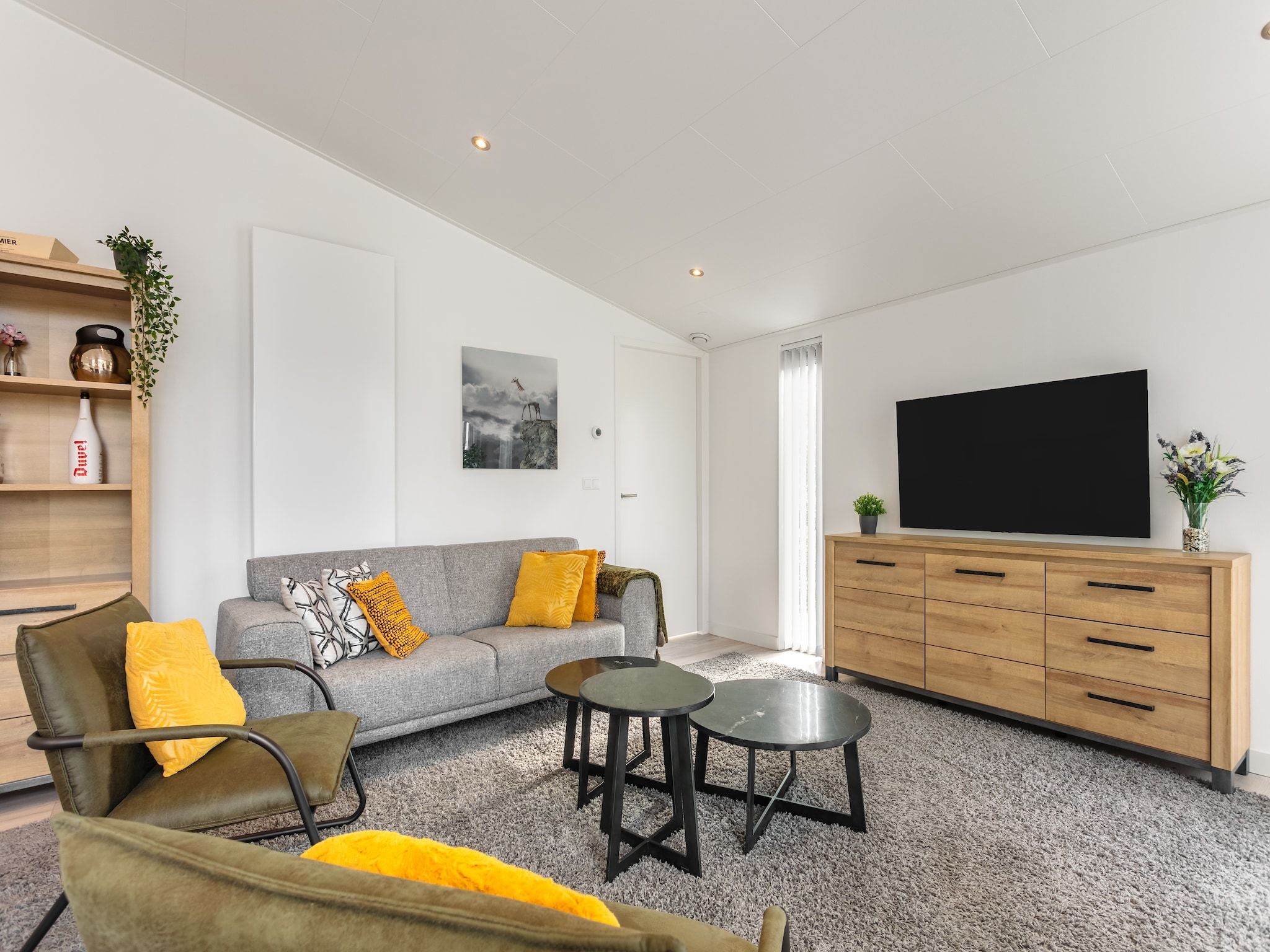 De woonkamer van Water Resort Oosterschelde 80 in Wemeldinge