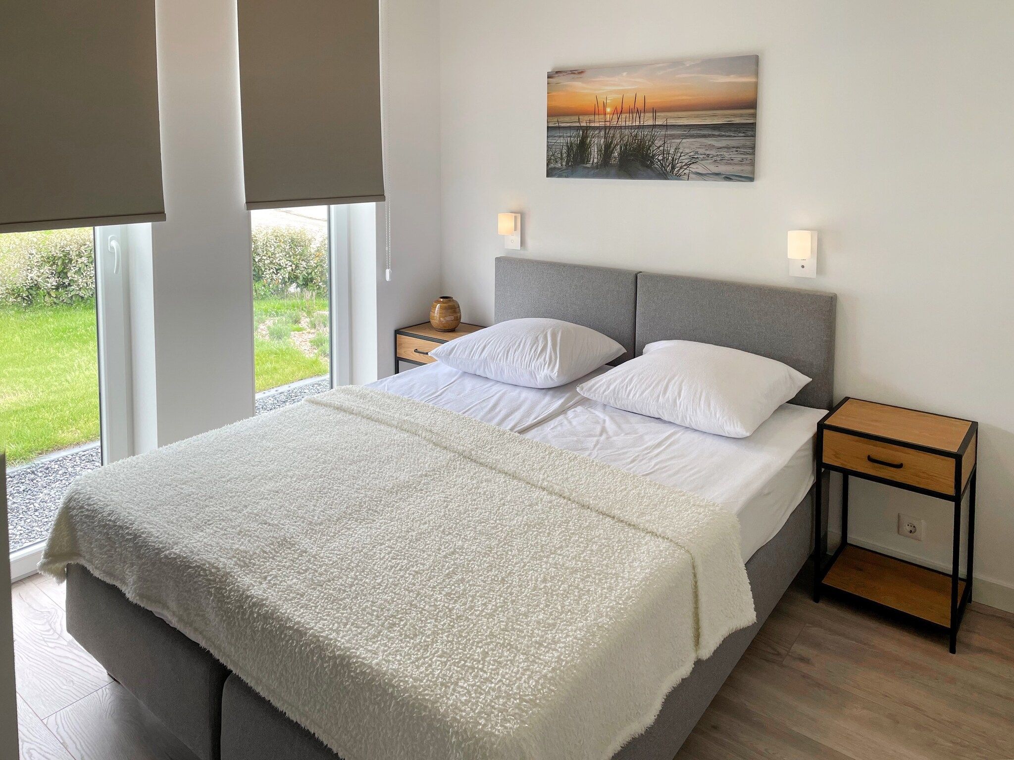 Een slaapkamer van Water Resort Oosterschelde 83 in Wemeldinge