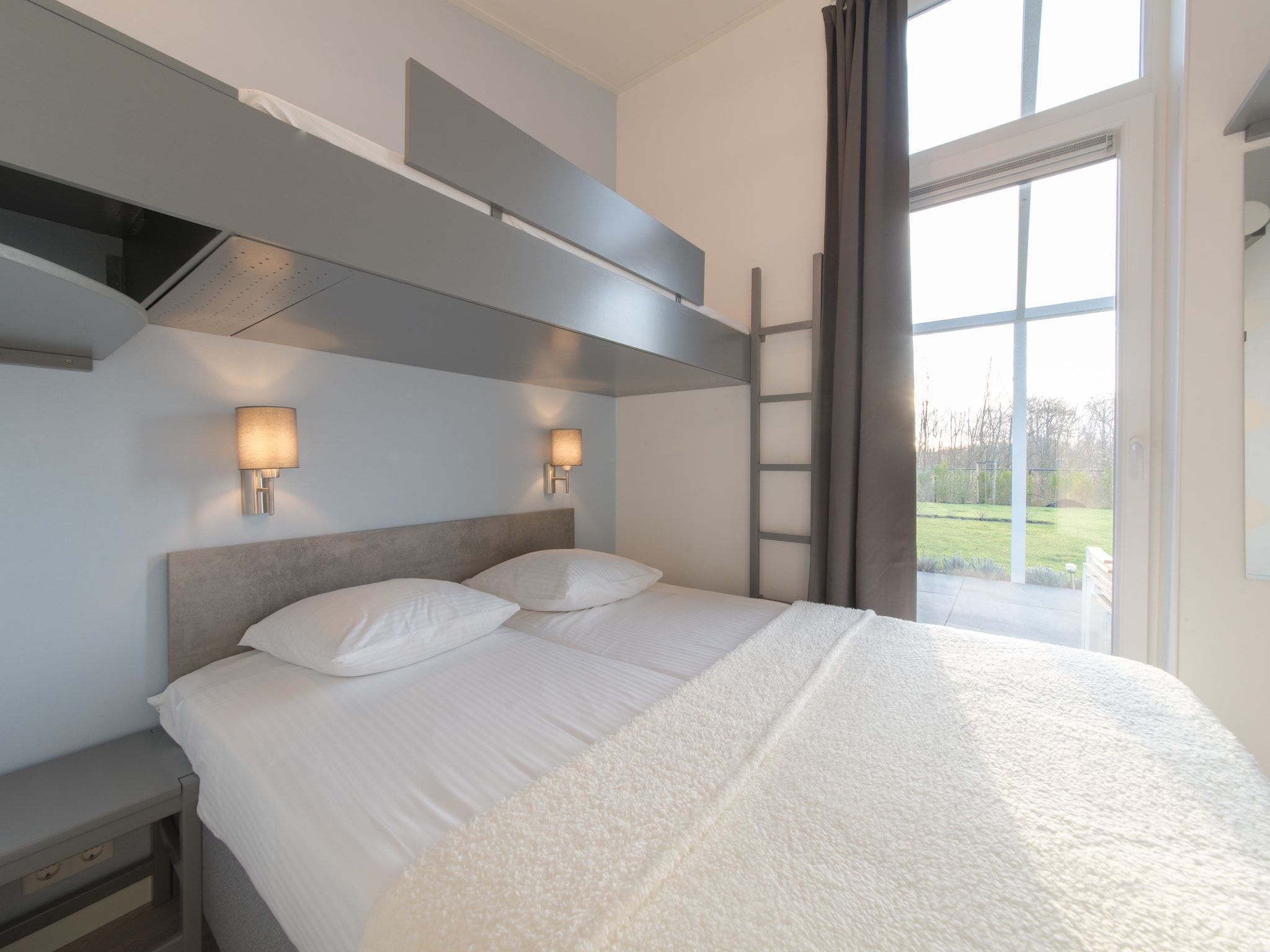 Een slaapkamer van Water Resort Oosterschelde 109 in Wemeldinge