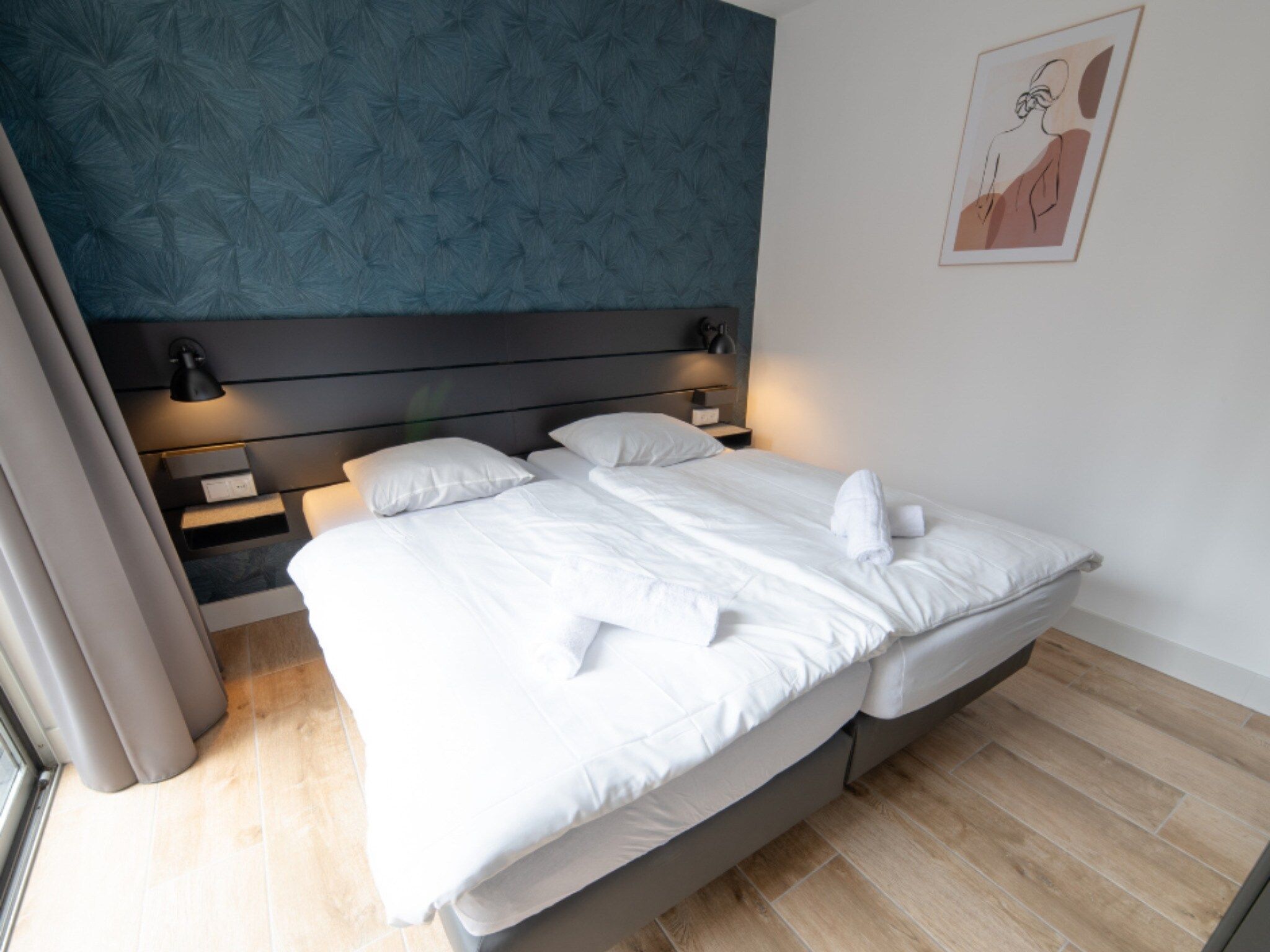 Een slaapkamer van 6 pers Welness huis 83 in Zevenhuizen