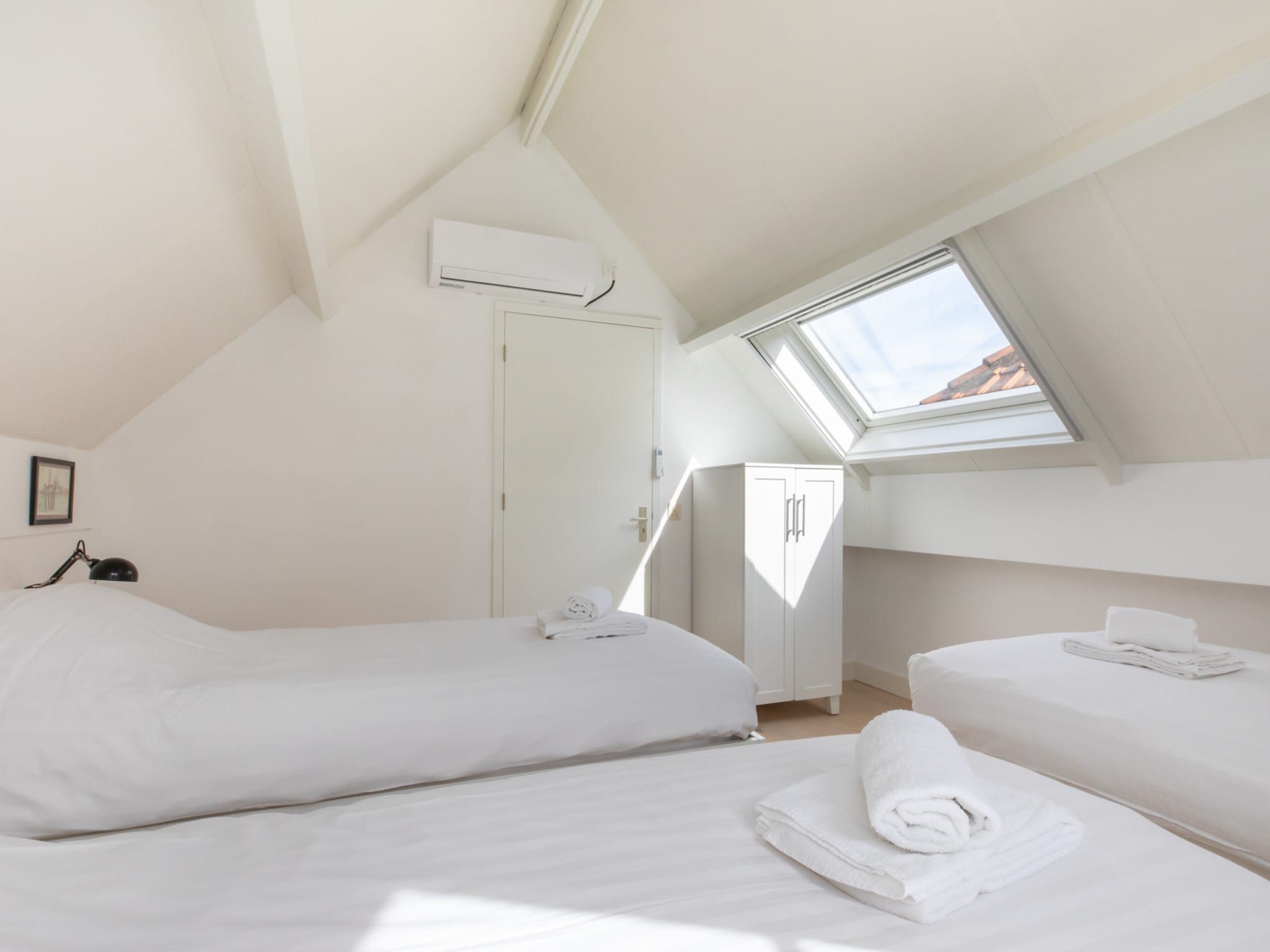 Een slaapkamer van Villa Querina in Koudekerke