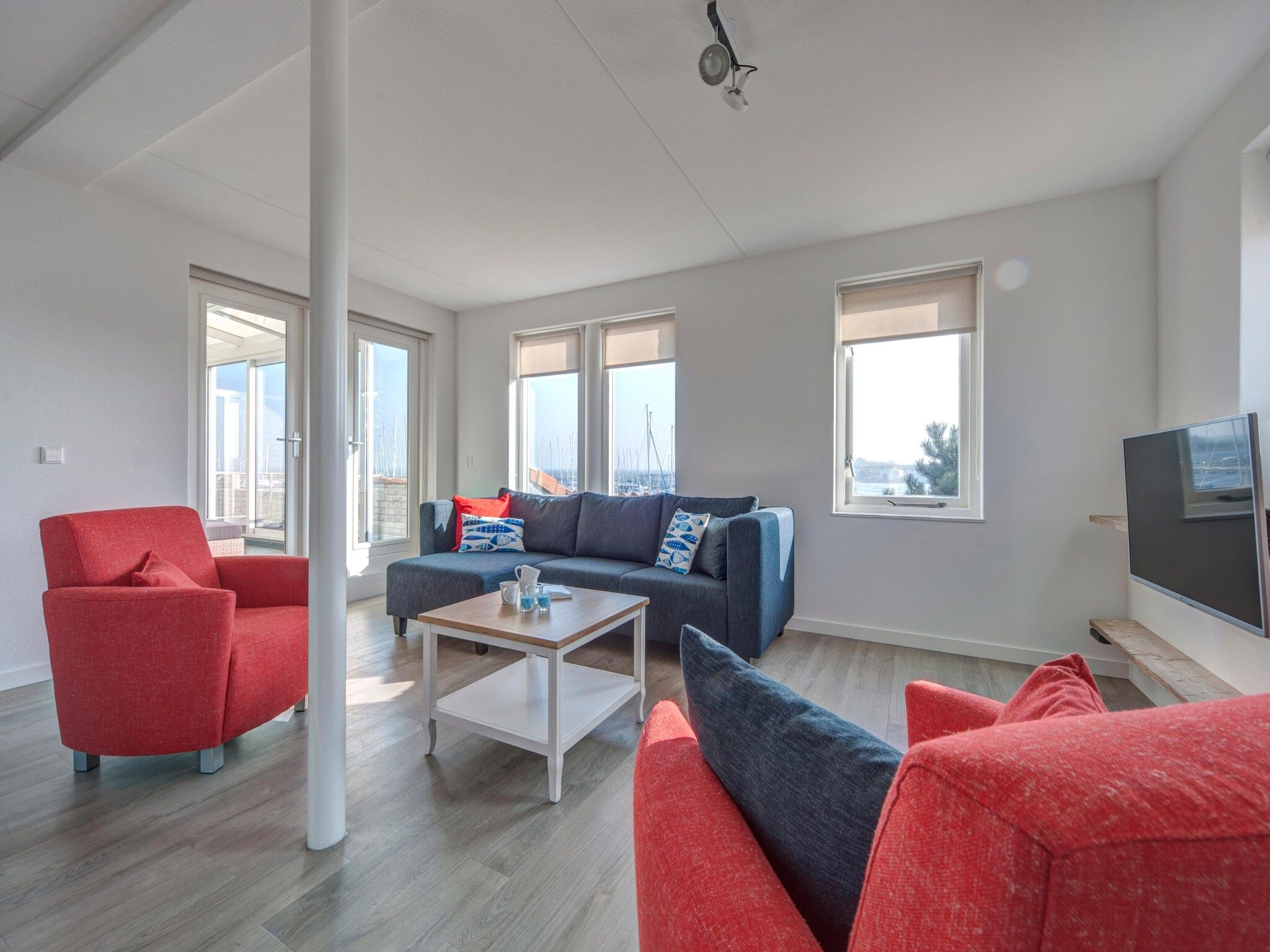 De woonkamer van Marina Port Zélande 1 in Ouddorp