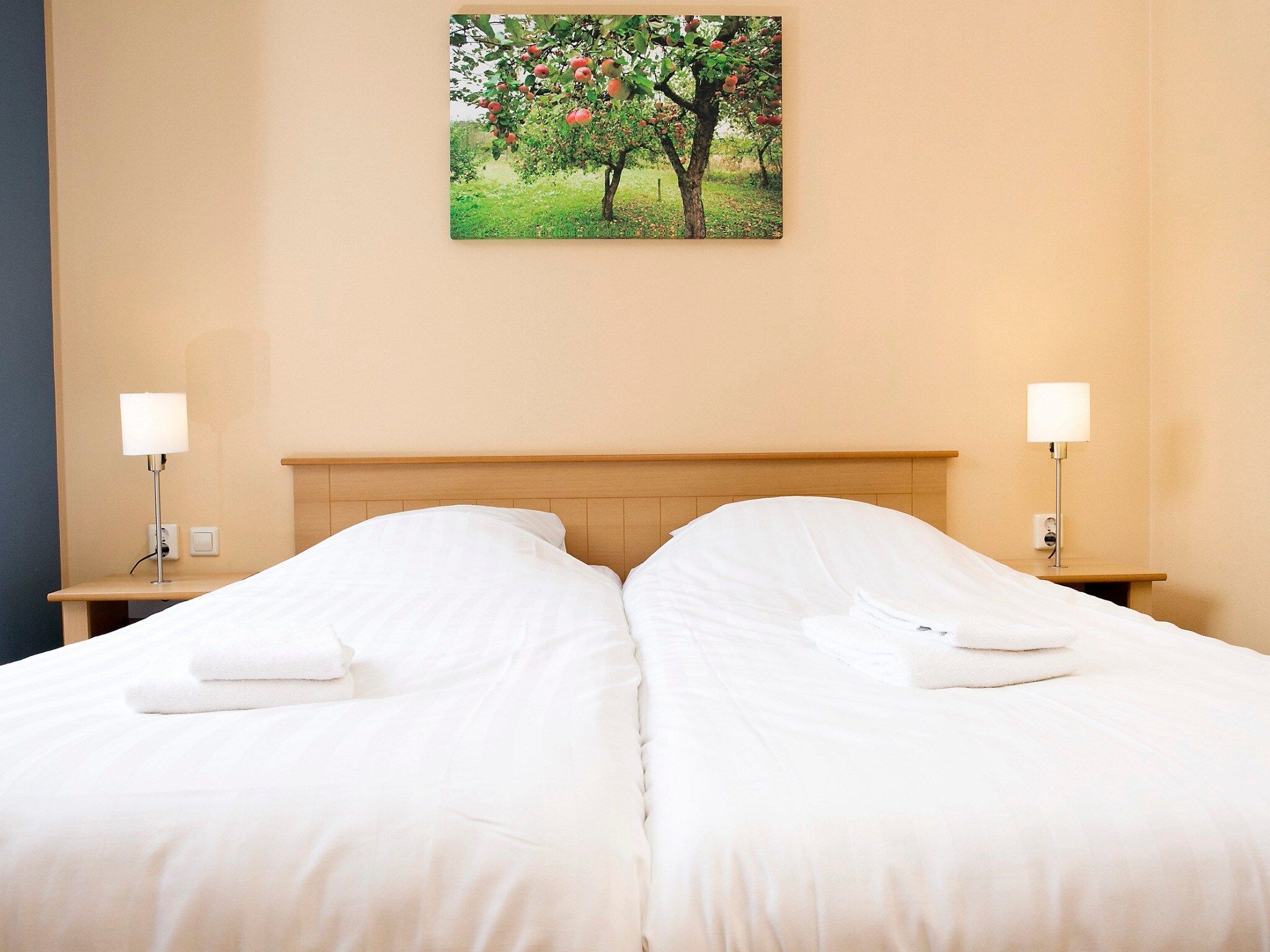 Een slaapkamer van Comfort bungalow – max 4 personen – Nummer 84 in Zevenhuizen